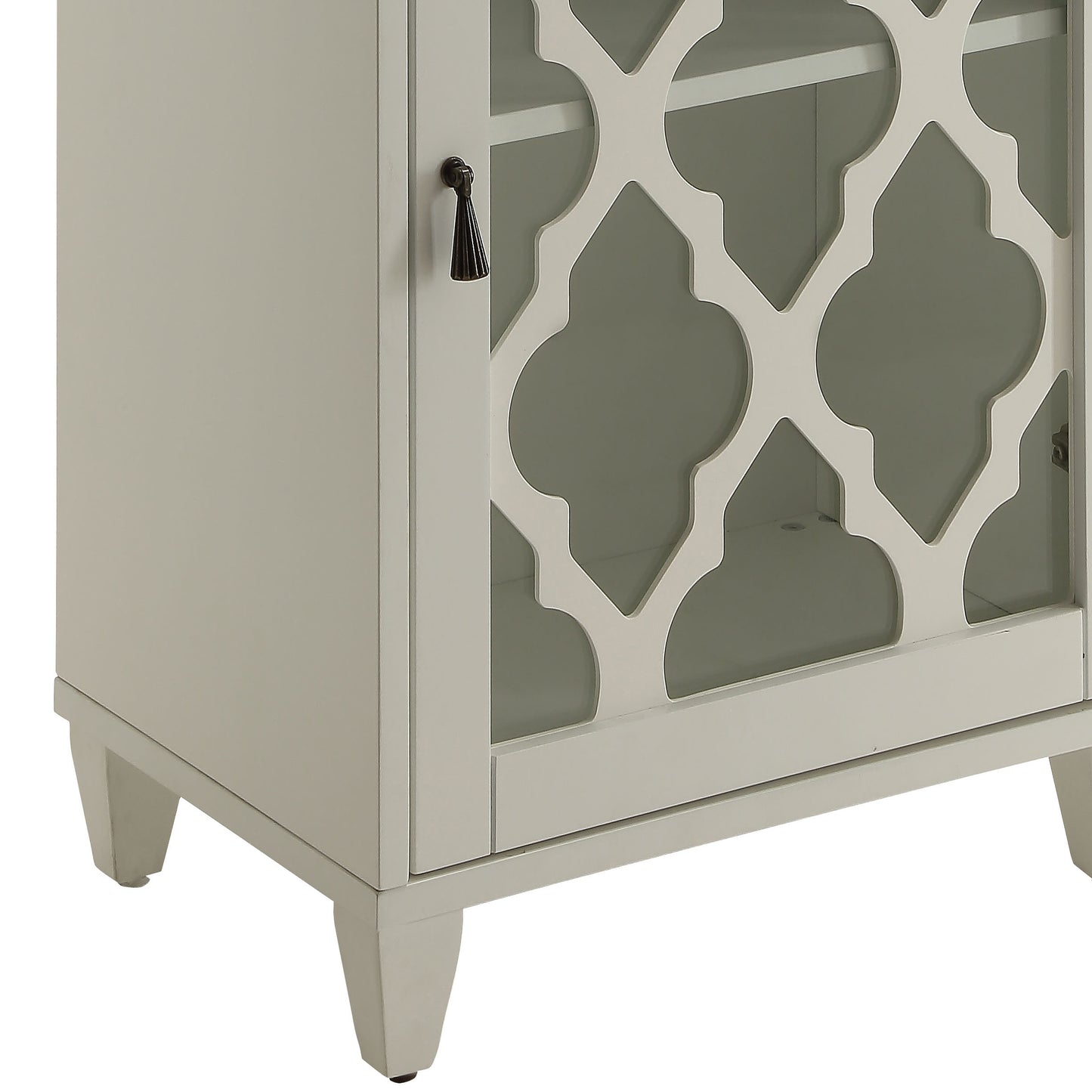 Light gray accent cabinet with decorative quatrefoil glass door and dark pull