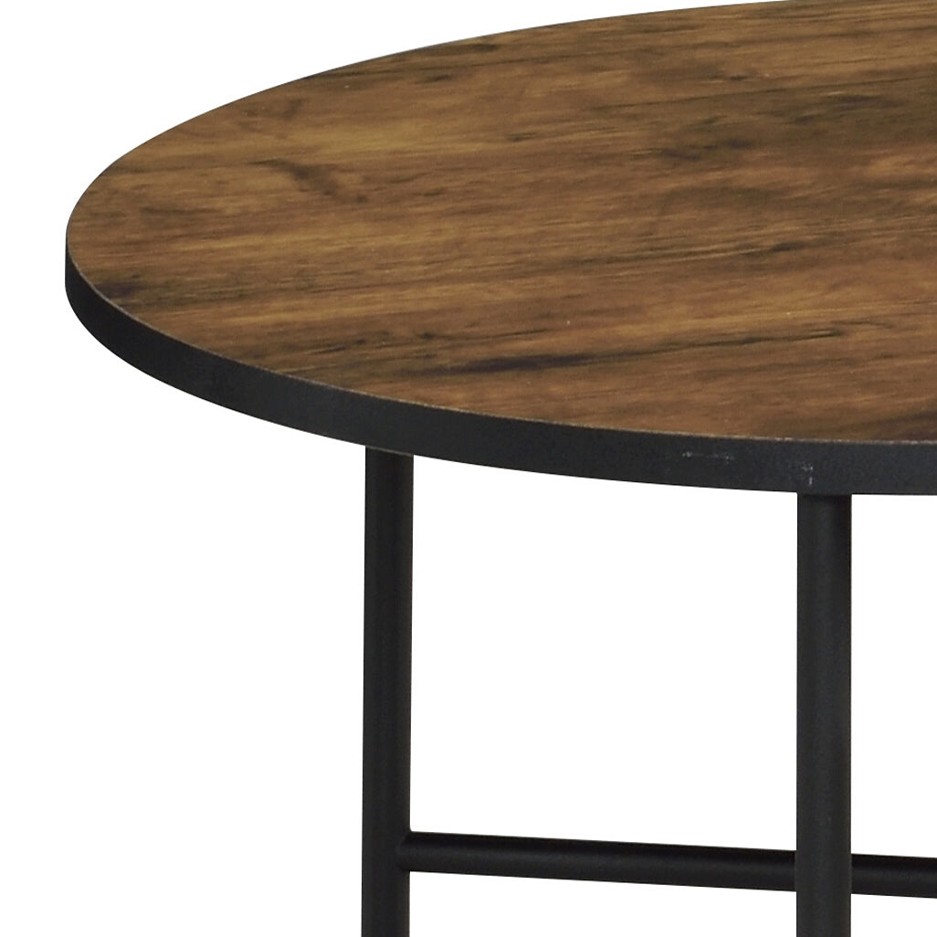Rustic round coffee table with distressed wood top and black metal legs