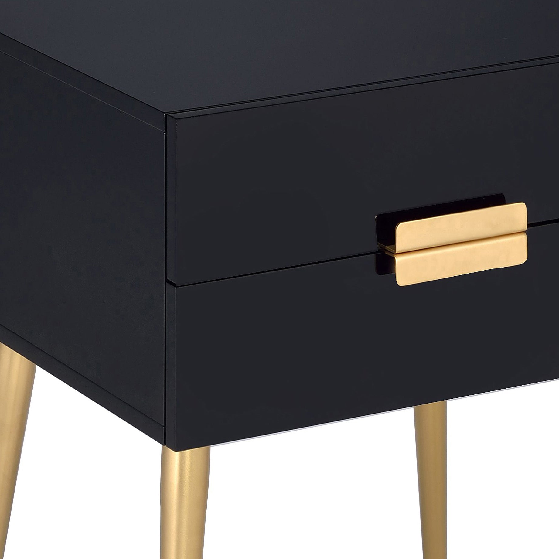 Sleek black nightstand with a gleaming gold drawer pull and tapered gold legs