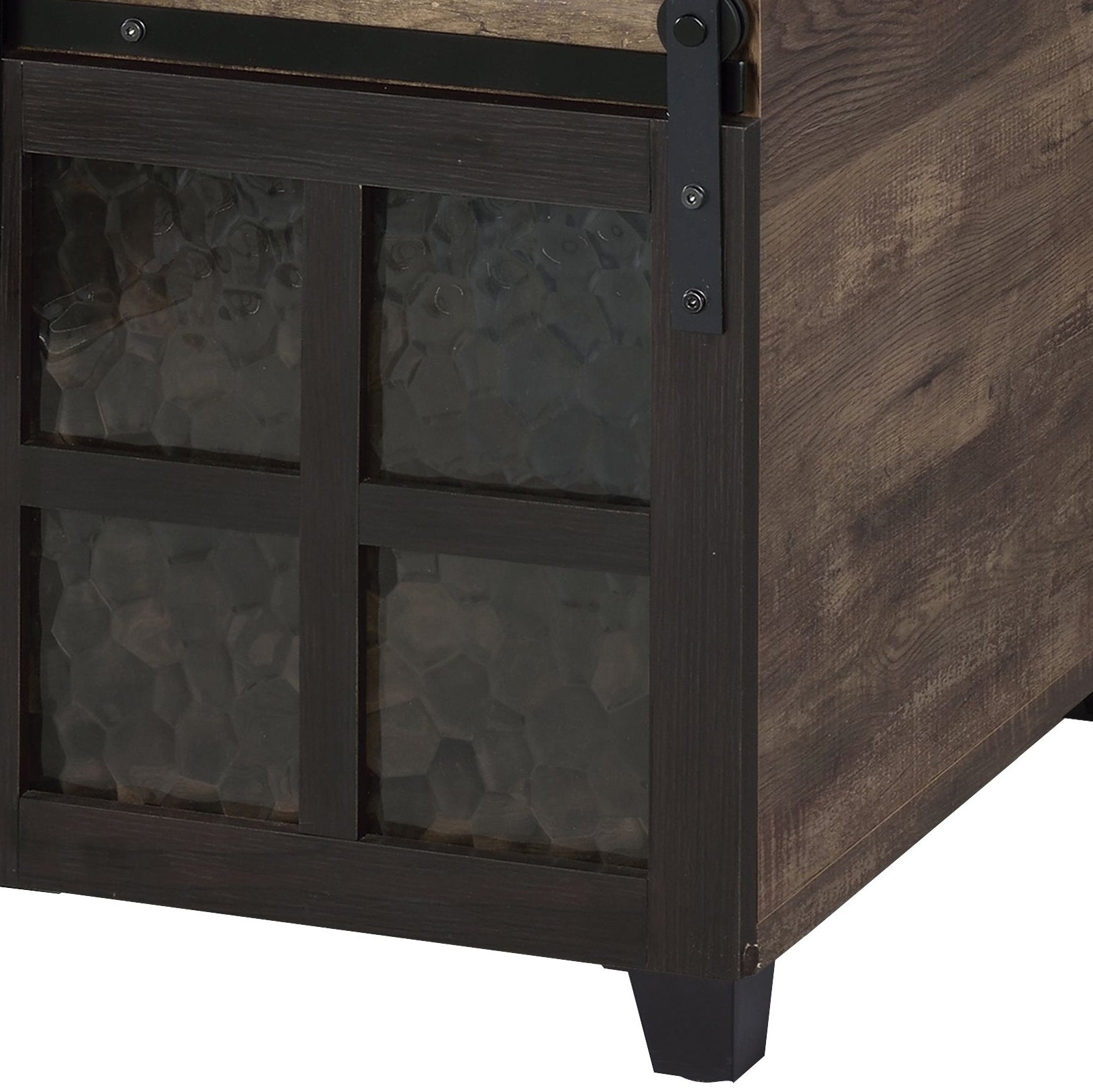 Rustic oak cabinet with frosted glass doors and sliding barn door hardware
