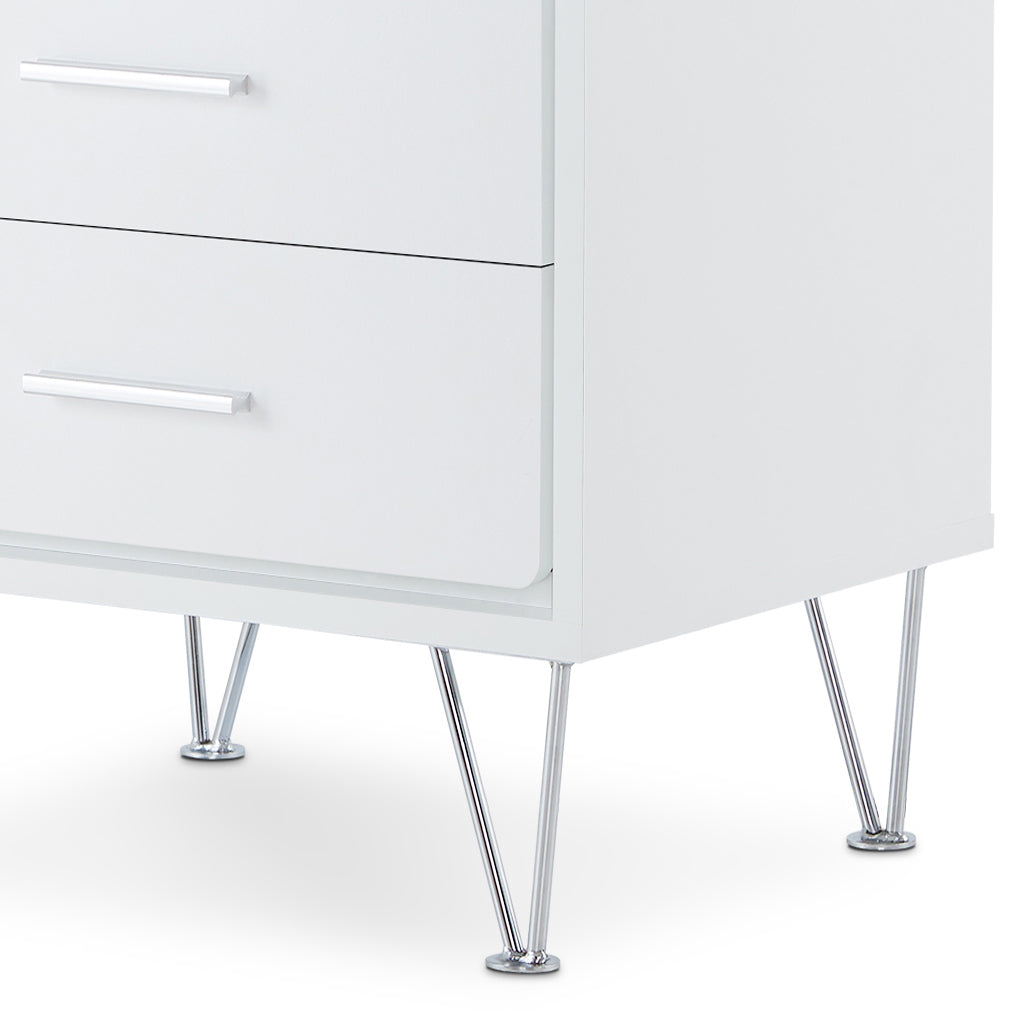 White modern dresser with silver hardware and slender metal legs