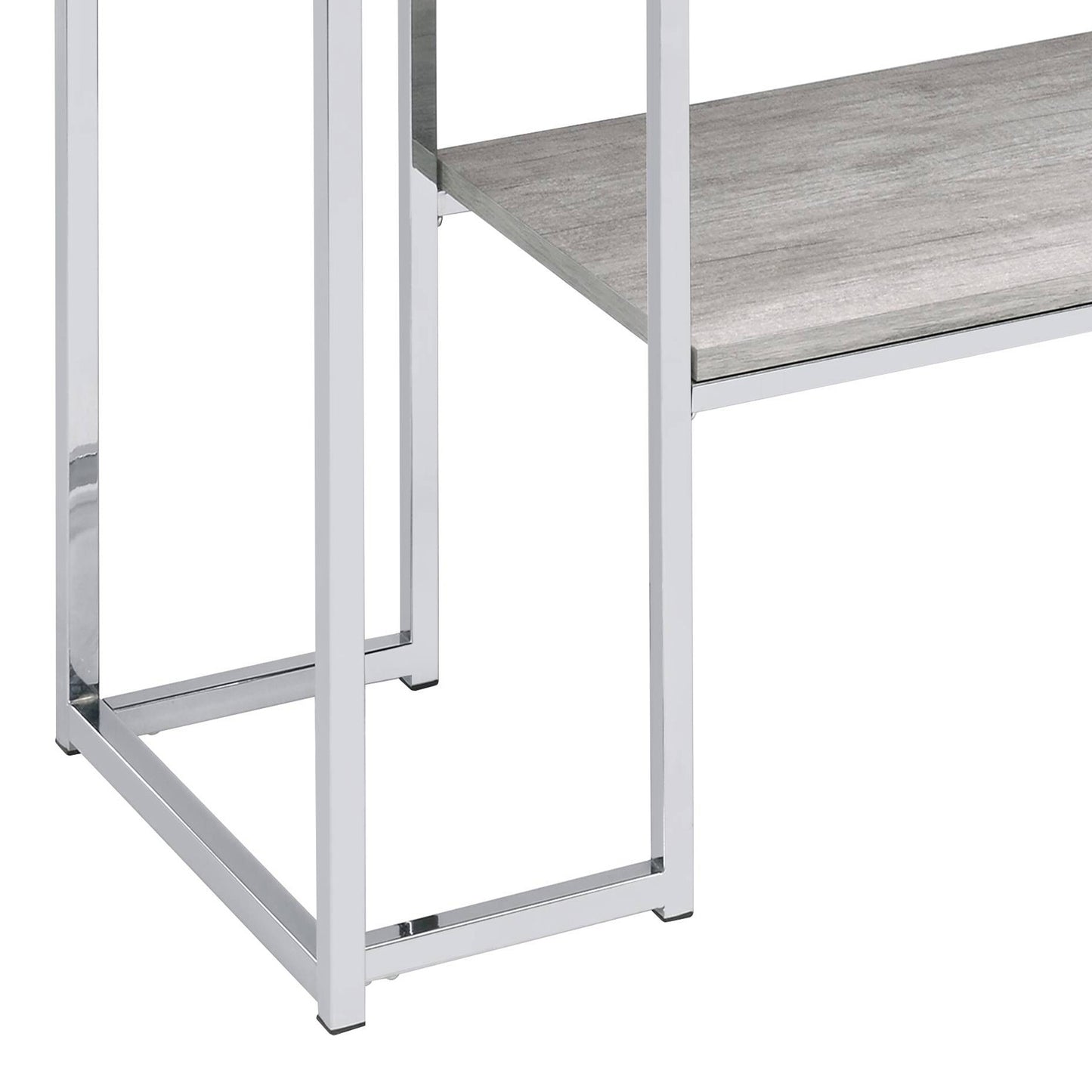 Chromeplated metal frame of a modern shelf unit with a grey wood grain shelf