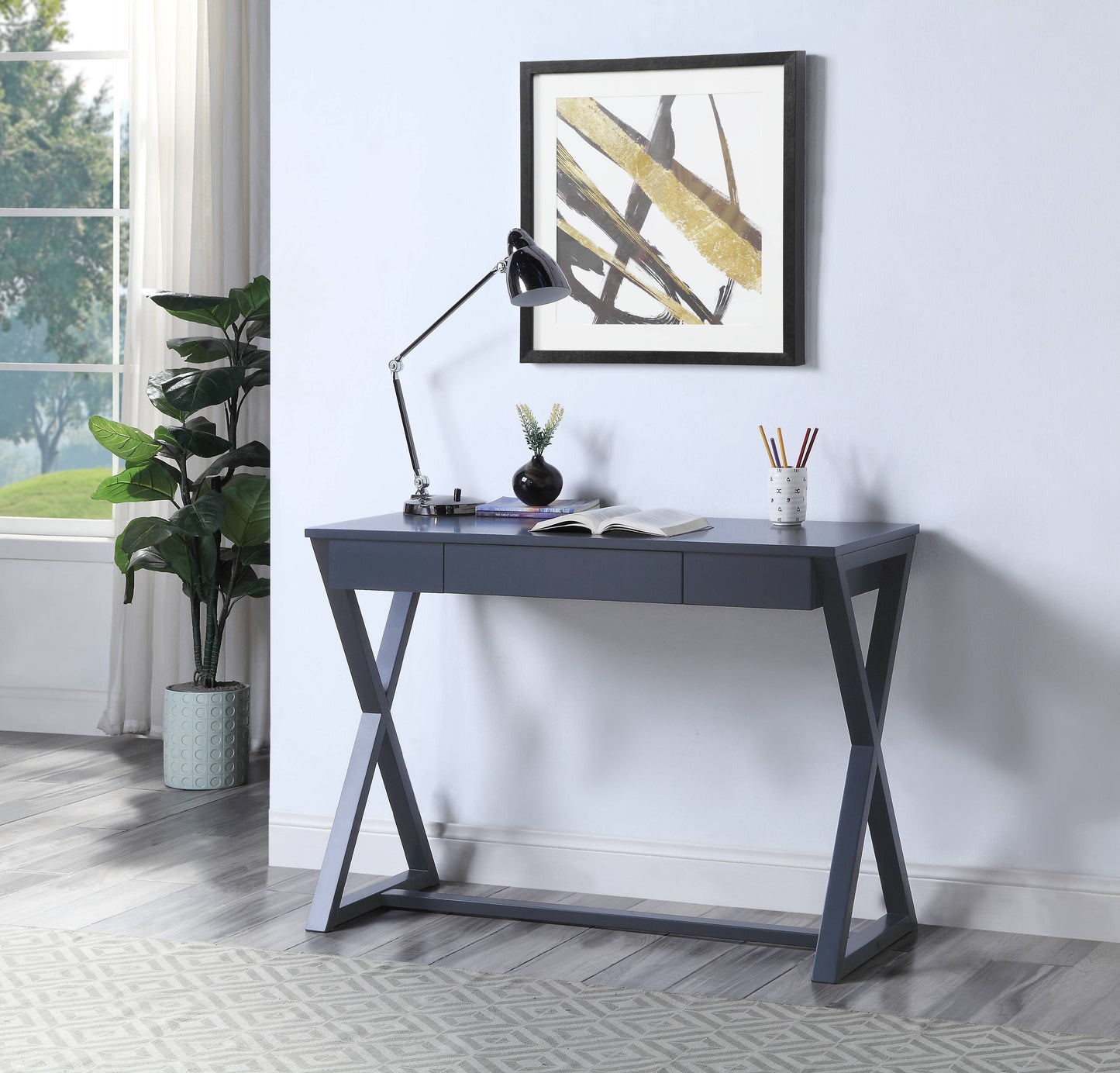 Modern dark grey desk with Xshaped legs and three drawers for home office