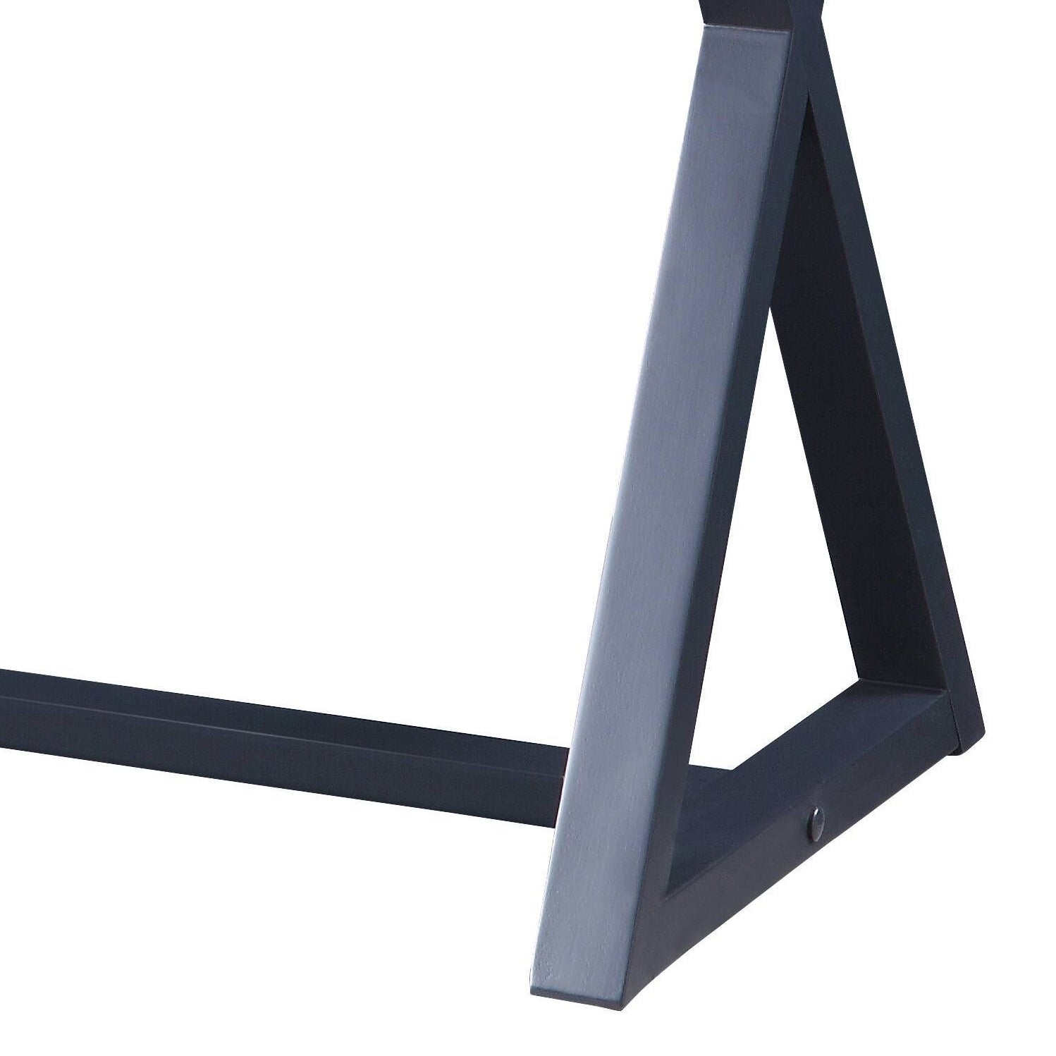 Dark metal table leg with angular design and geometric frame detail