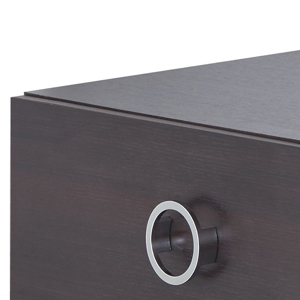 Dark wood drawer with a modern silver ring pull hardware