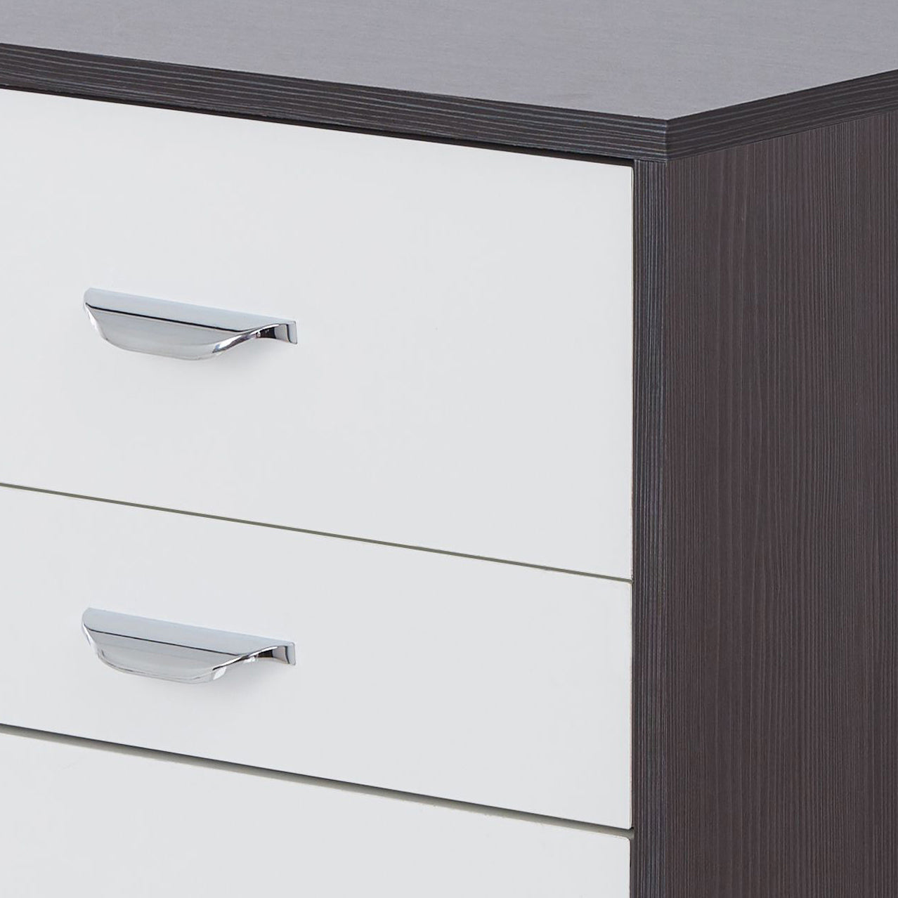 White dresser with dark wood accents and chrome handles modern design