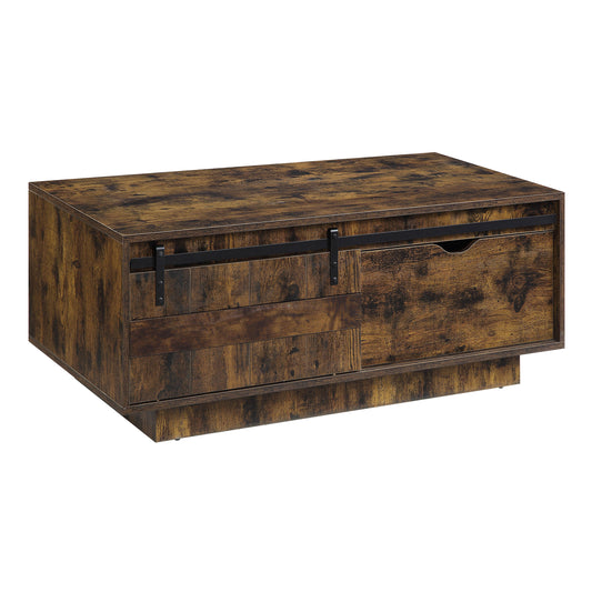 Rustic brown wooden coffee table with sliding barn door and drawer