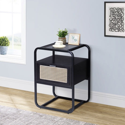 Black nightstand with woven cane drawer front and metal frame