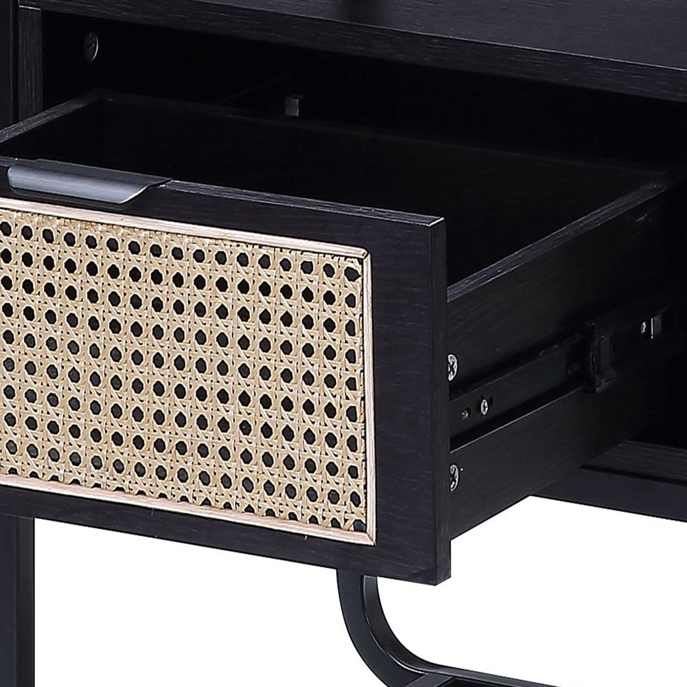 Black wood nightstand drawer with woven rattan front panel detail