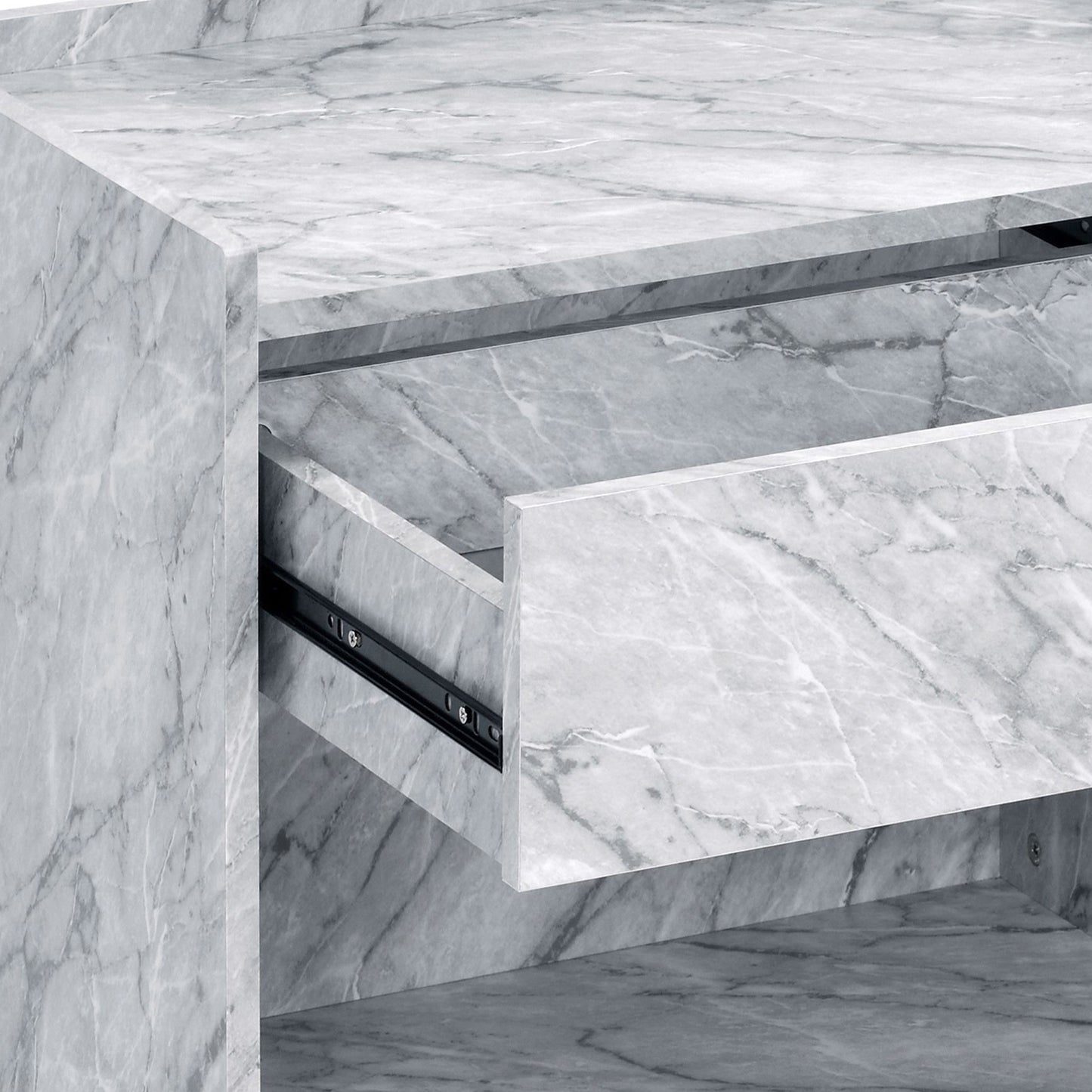 White marble cabinet with an open drawer revealing black metal runners