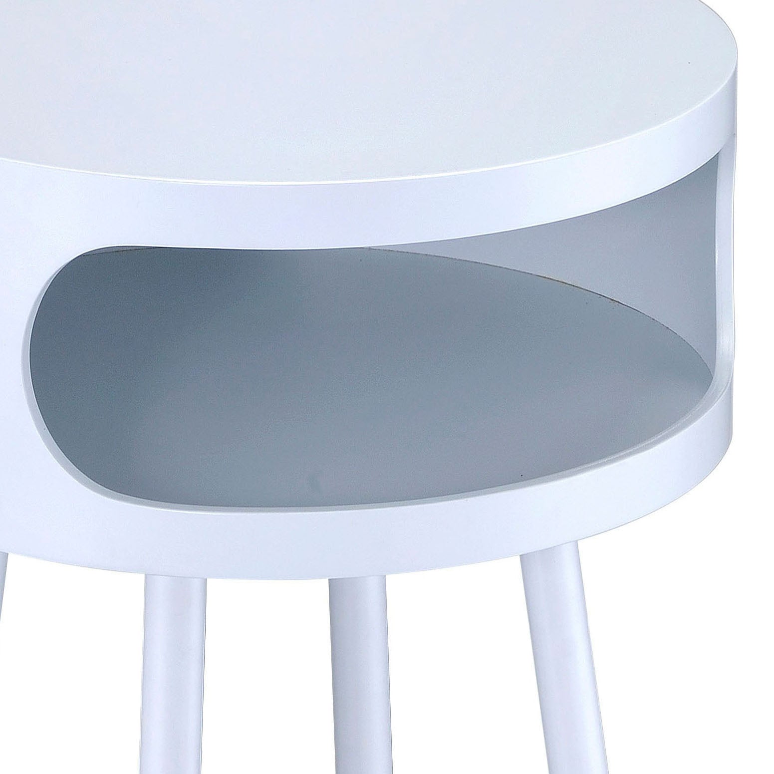 White round bedside table with a minimalist open shelf perfect for modern bedrooms
