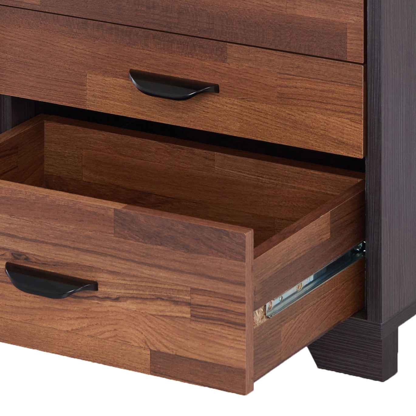 Dark wood dresser drawer with black handle showing interior storage