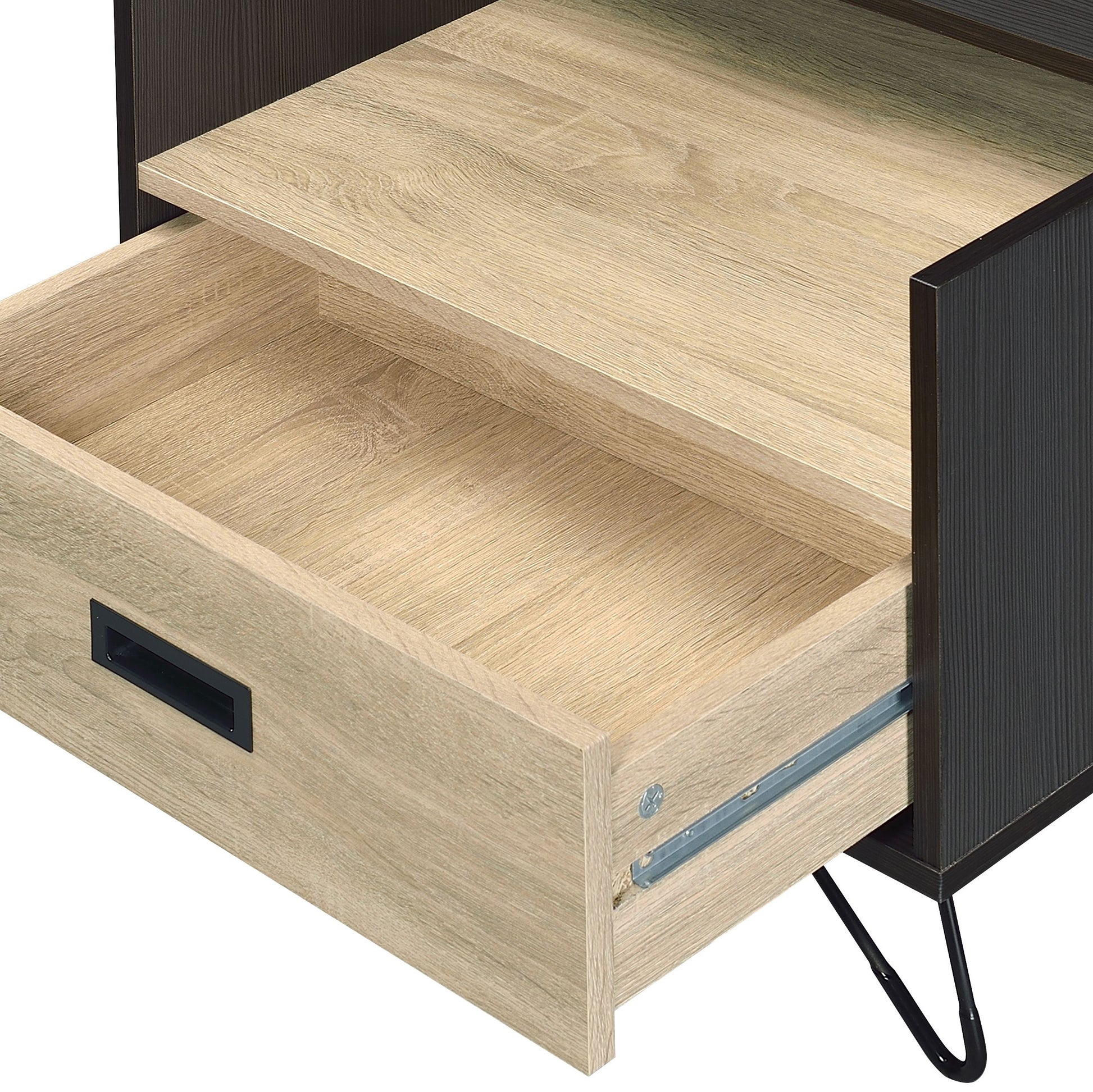Open drawer of a modern nightstand with light wood grain and black accents