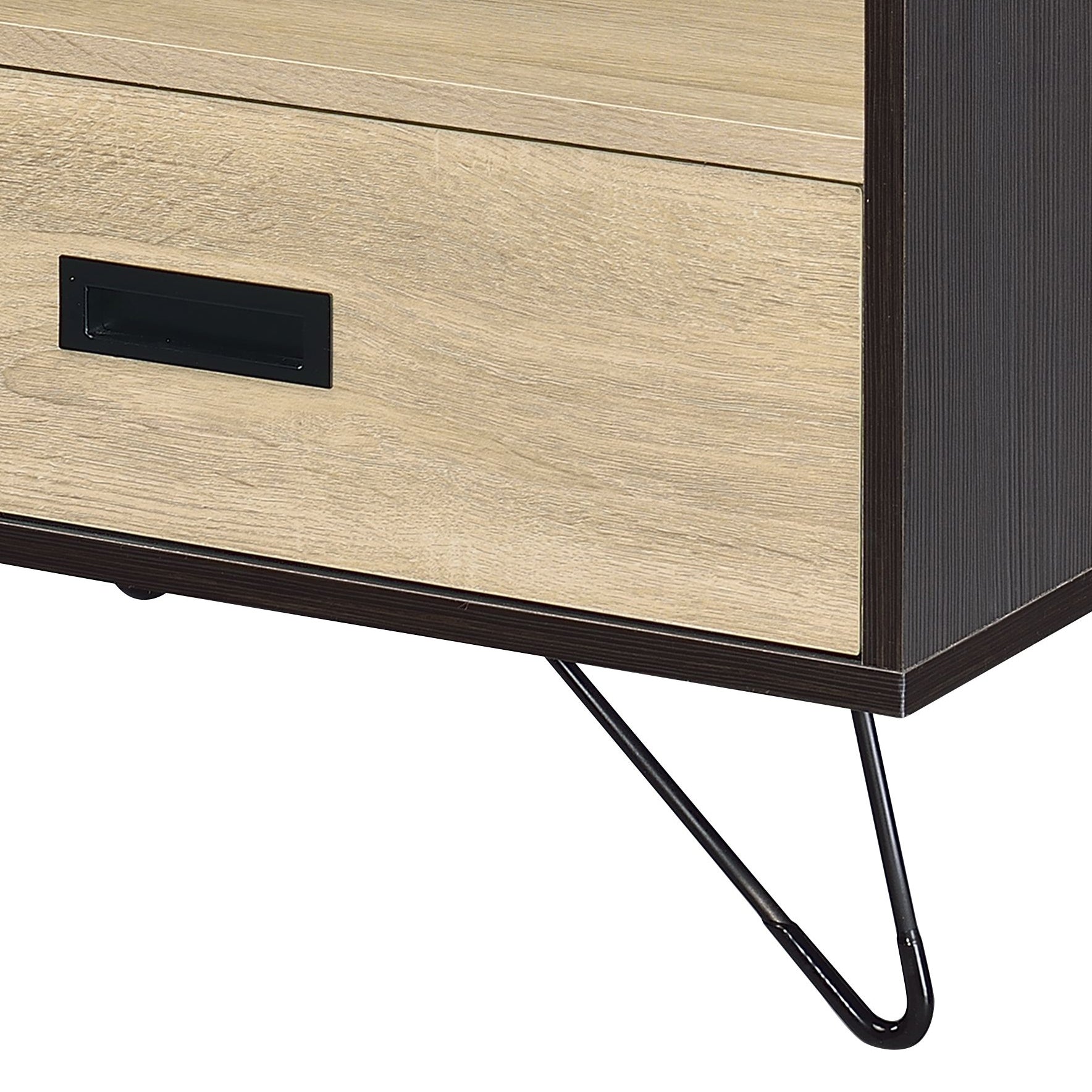 Light wood finish drawer with black inset handle on a modern dresser