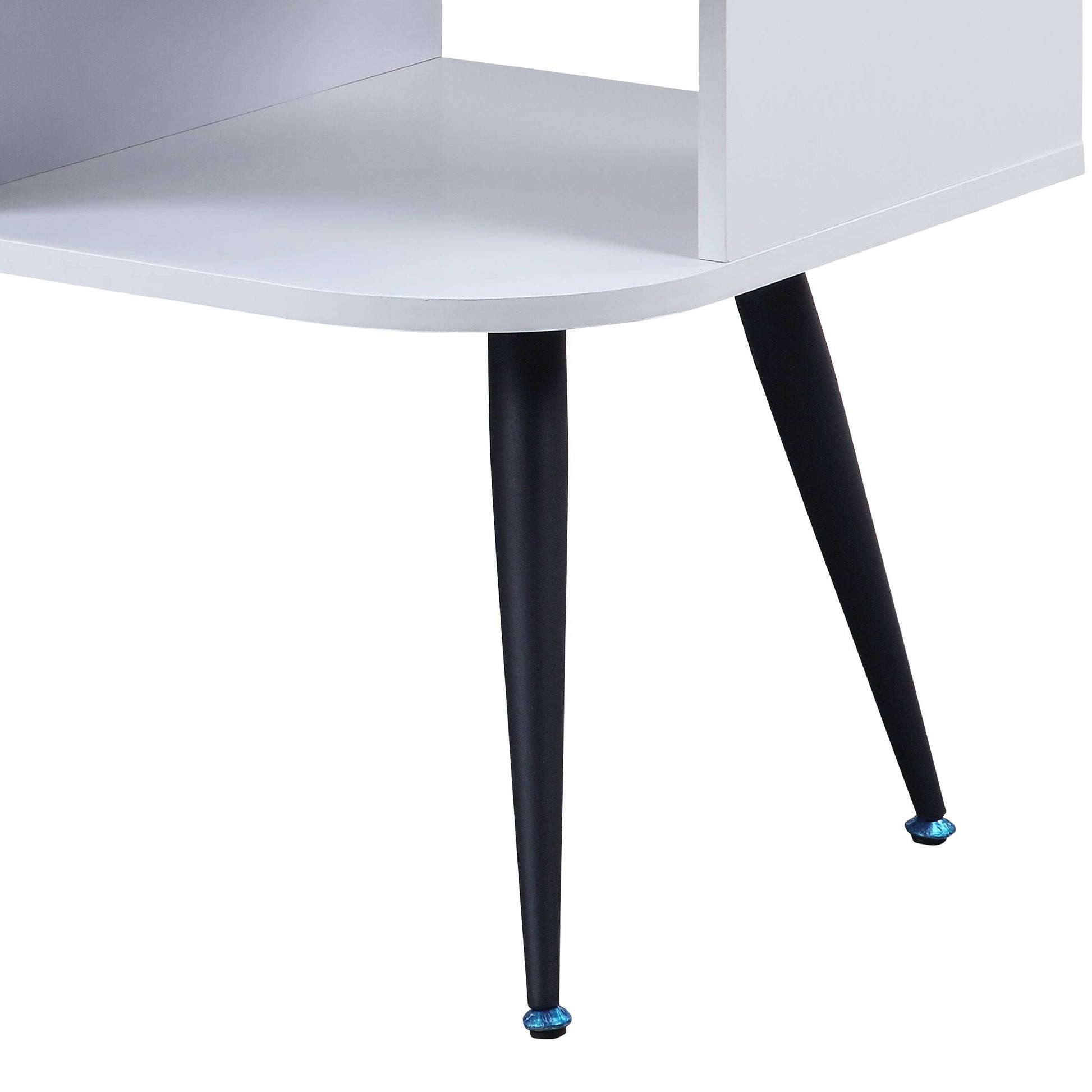 Modern white side table with black tapered legs and blue decorative feet
