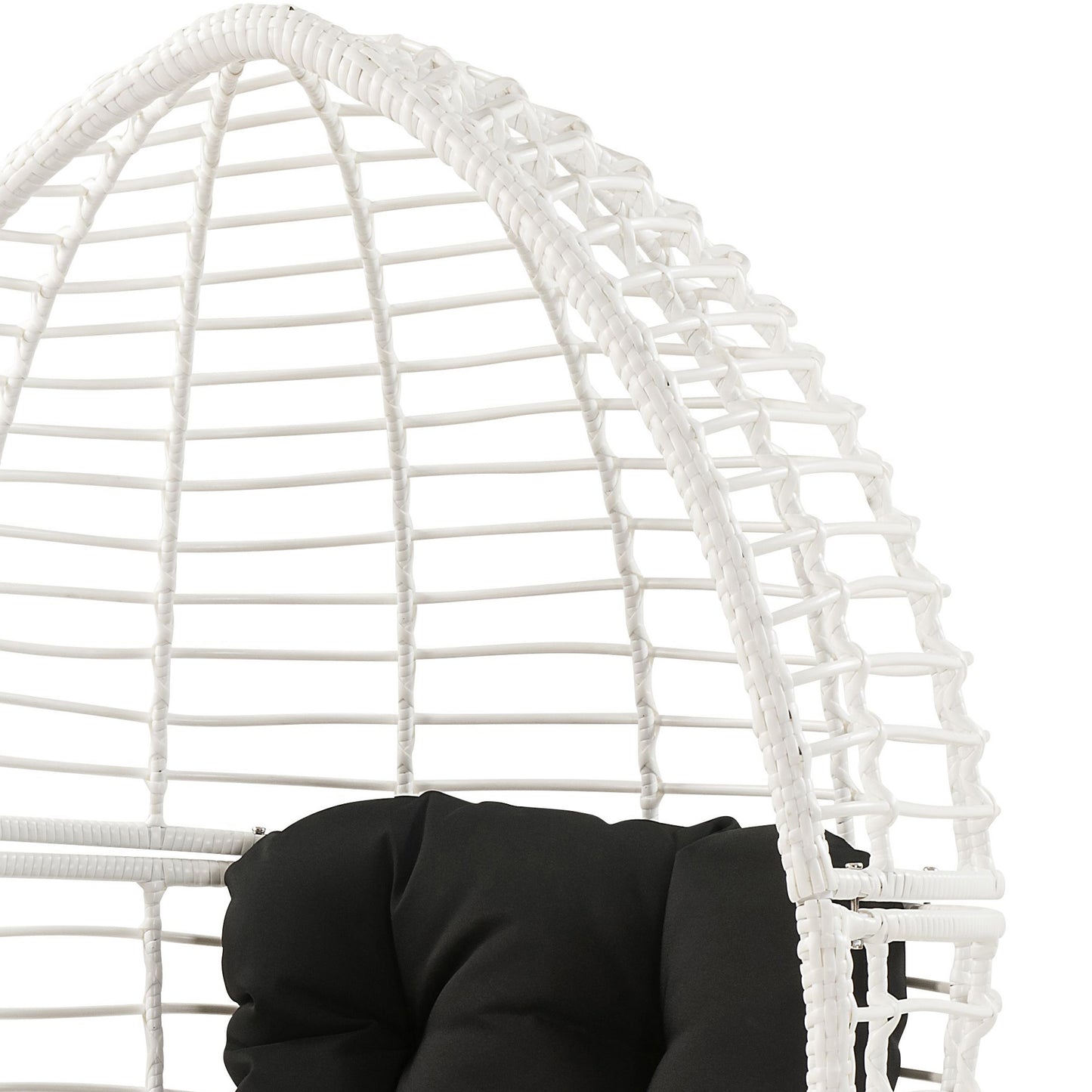 Closeup of white rattan weave on an egg chair highlighting textured wicker construction