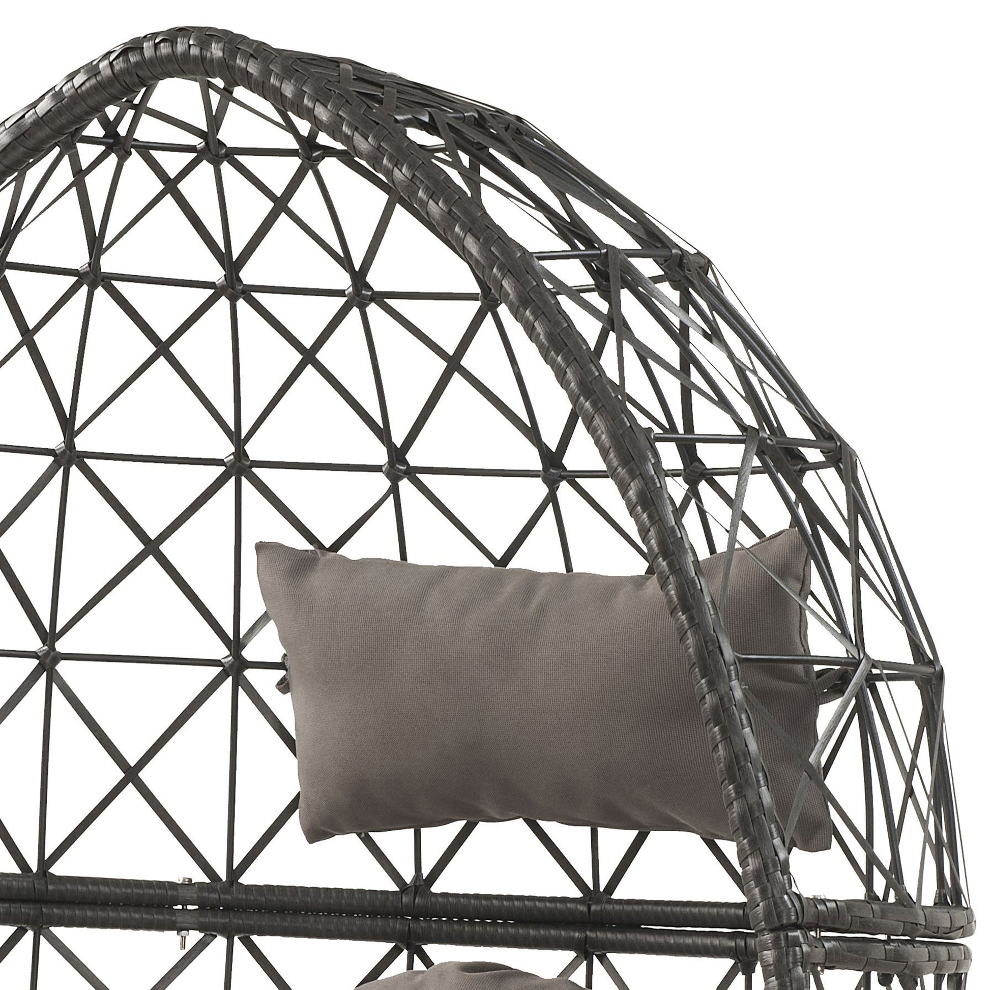 Closeup of dark grey wicker egg chair frame with grey cushion