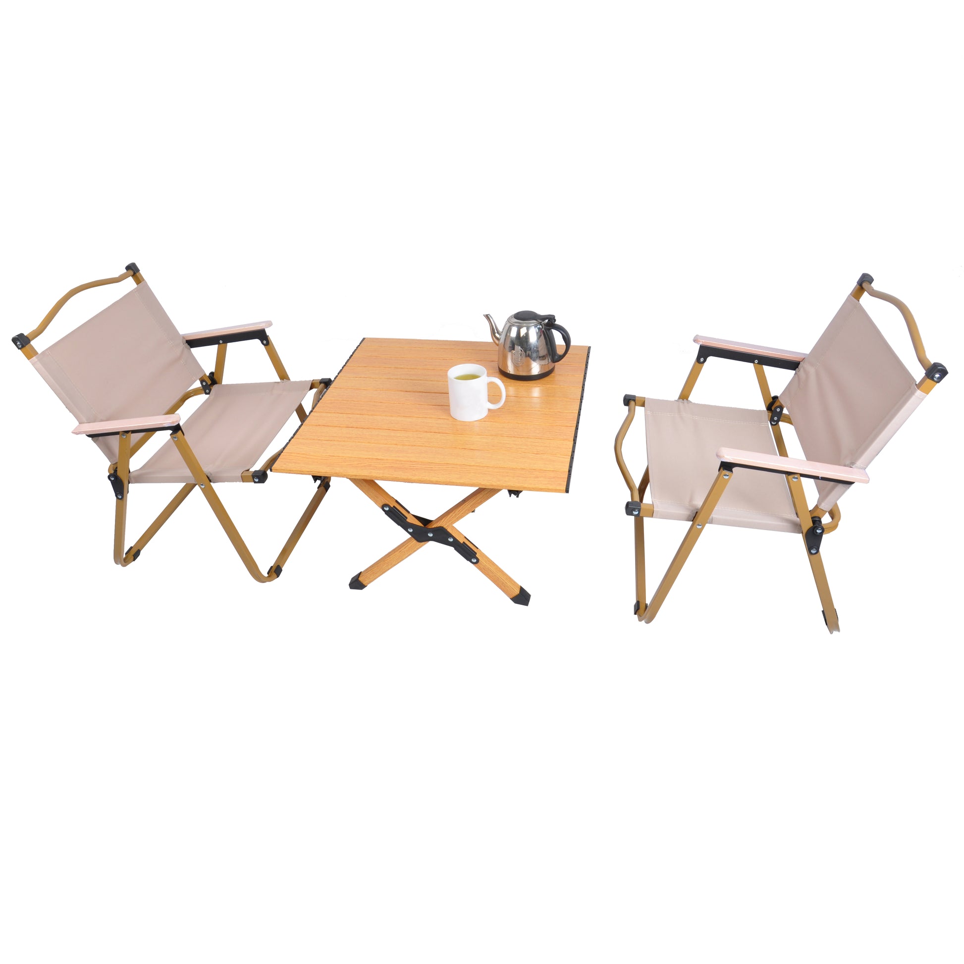 Two beige canvas folding chairs flank a wooden portable camping table with a kettle and cup