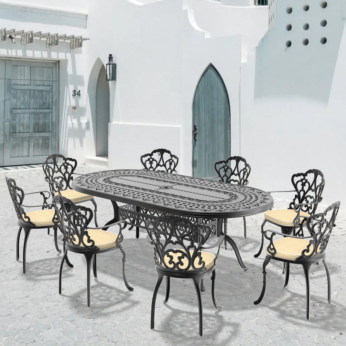 Black cast aluminum patio dining set with oval table and six chairs