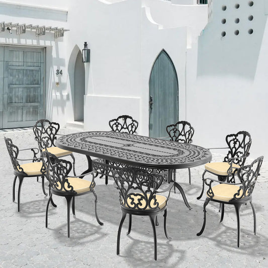 Black cast aluminum patio dining set with oval table and six chairs