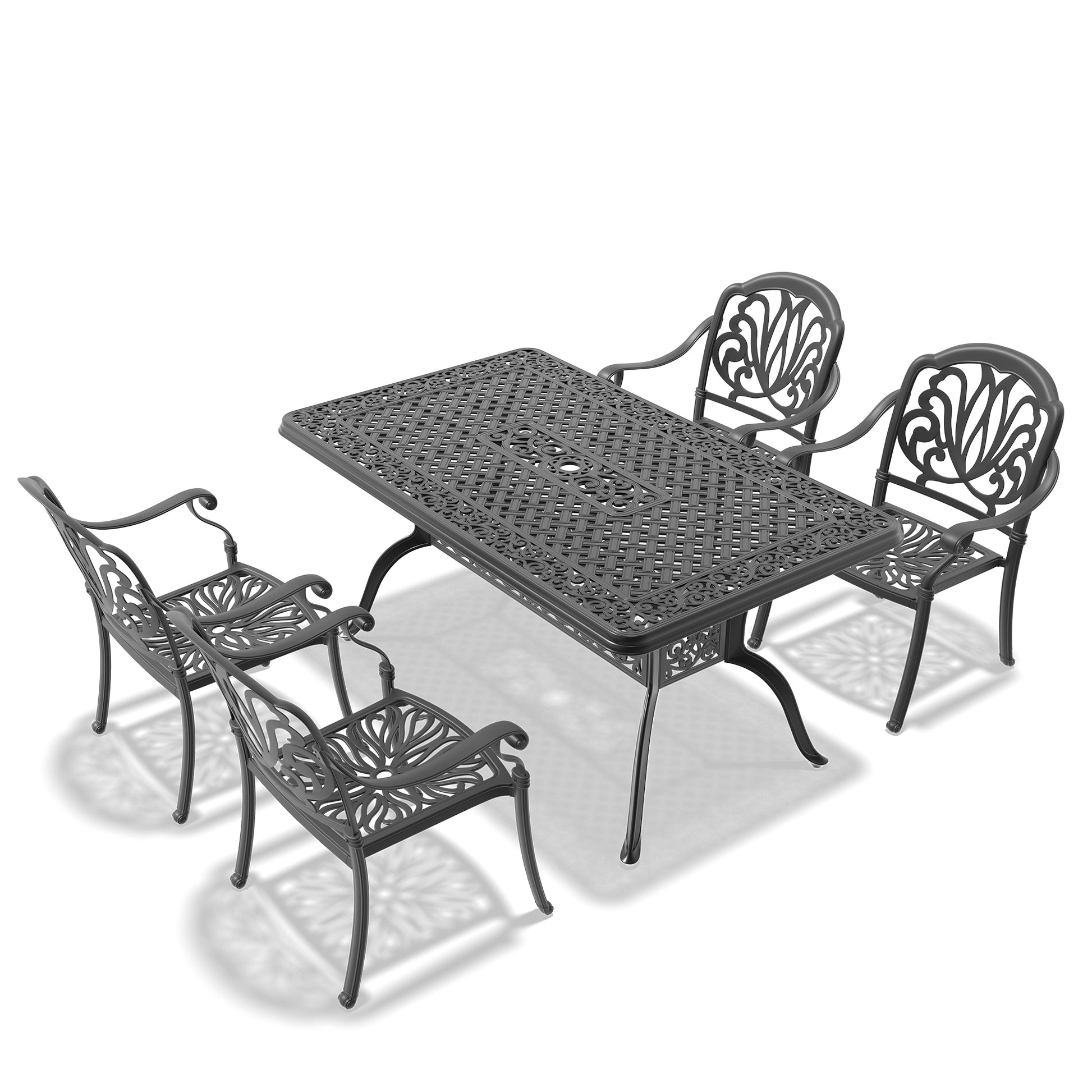 Ornate cast iron patio dining set with four chairs and a rectangular table