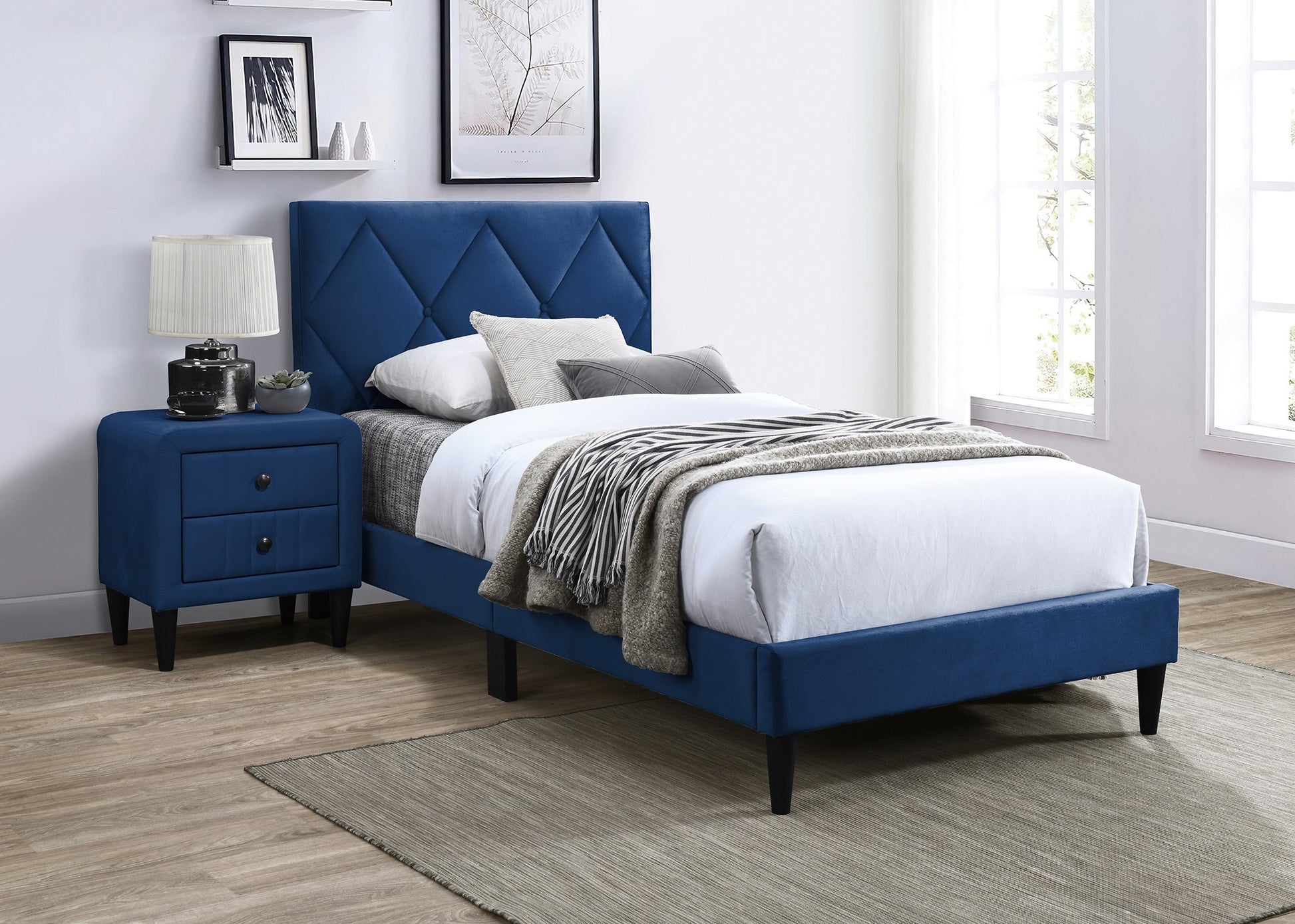 Royal blue upholstered twin bed with diamond tufted headboard