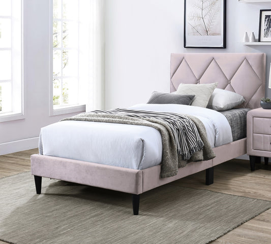 Pink velvet upholstered bed frame with diamond tufted headboard and dark tapered legs
