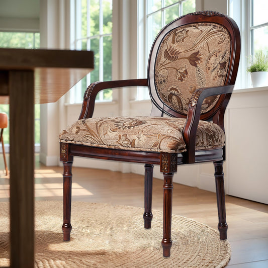 Elegant antique accent chair with carved dark wood frame and ornate floral upholstery
