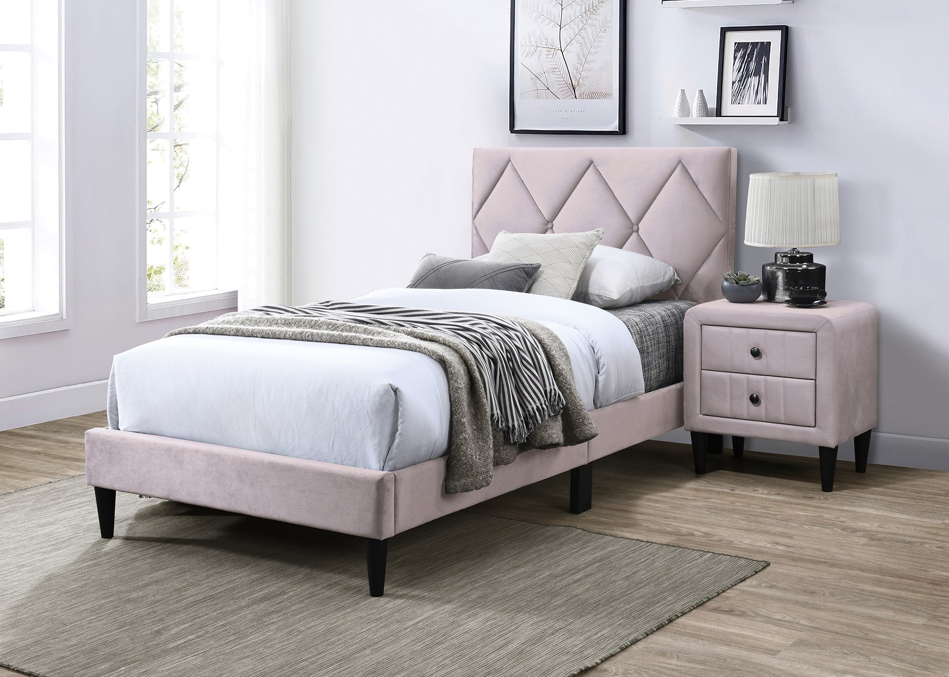 Pink velvet twin bed with diamondtufted headboard