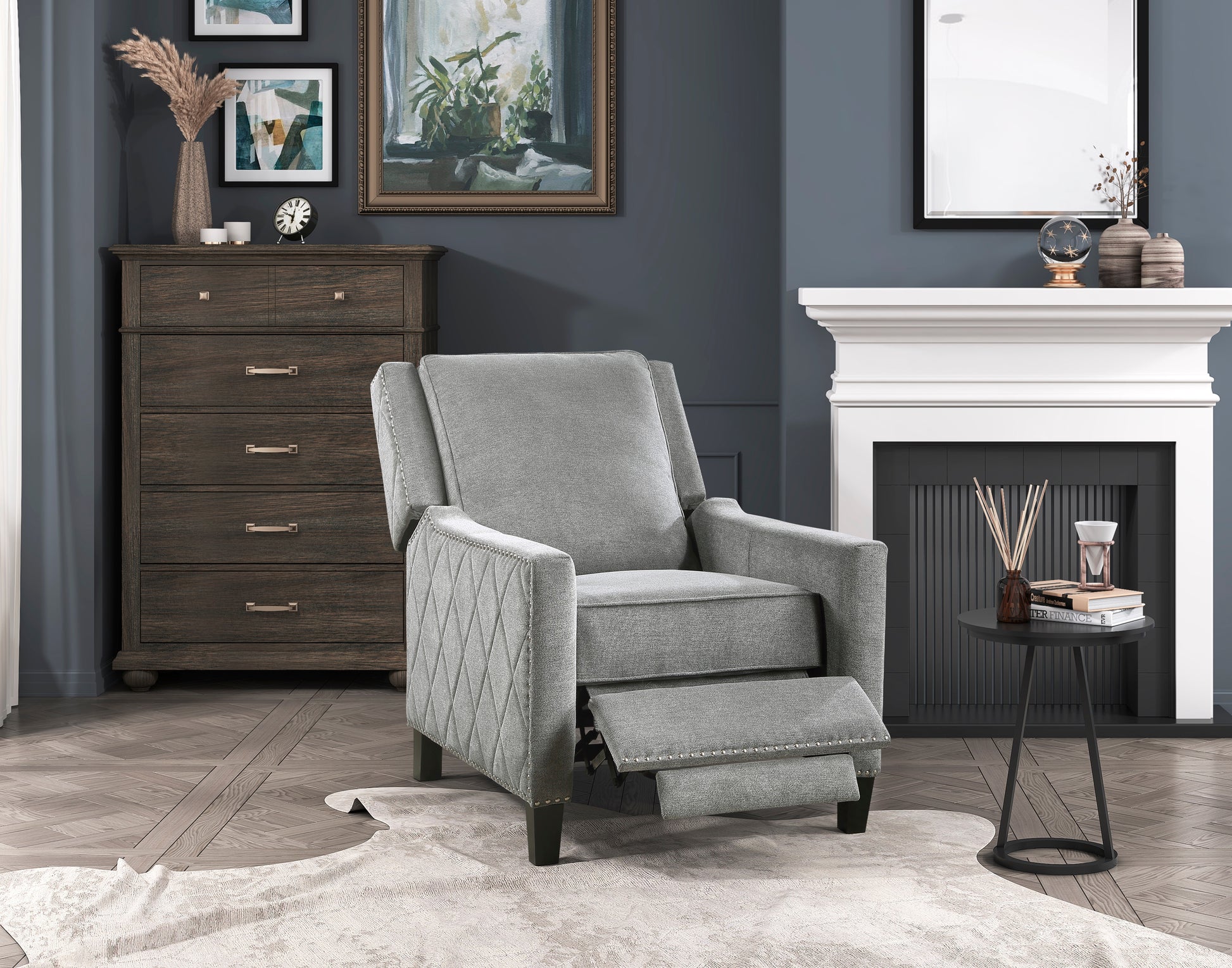 Gray fabric recliner with diamond tufting and nailhead trim featuring extended footrest