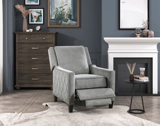 Gray fabric recliner with diamond tufting and nailhead trim featuring extended footrest