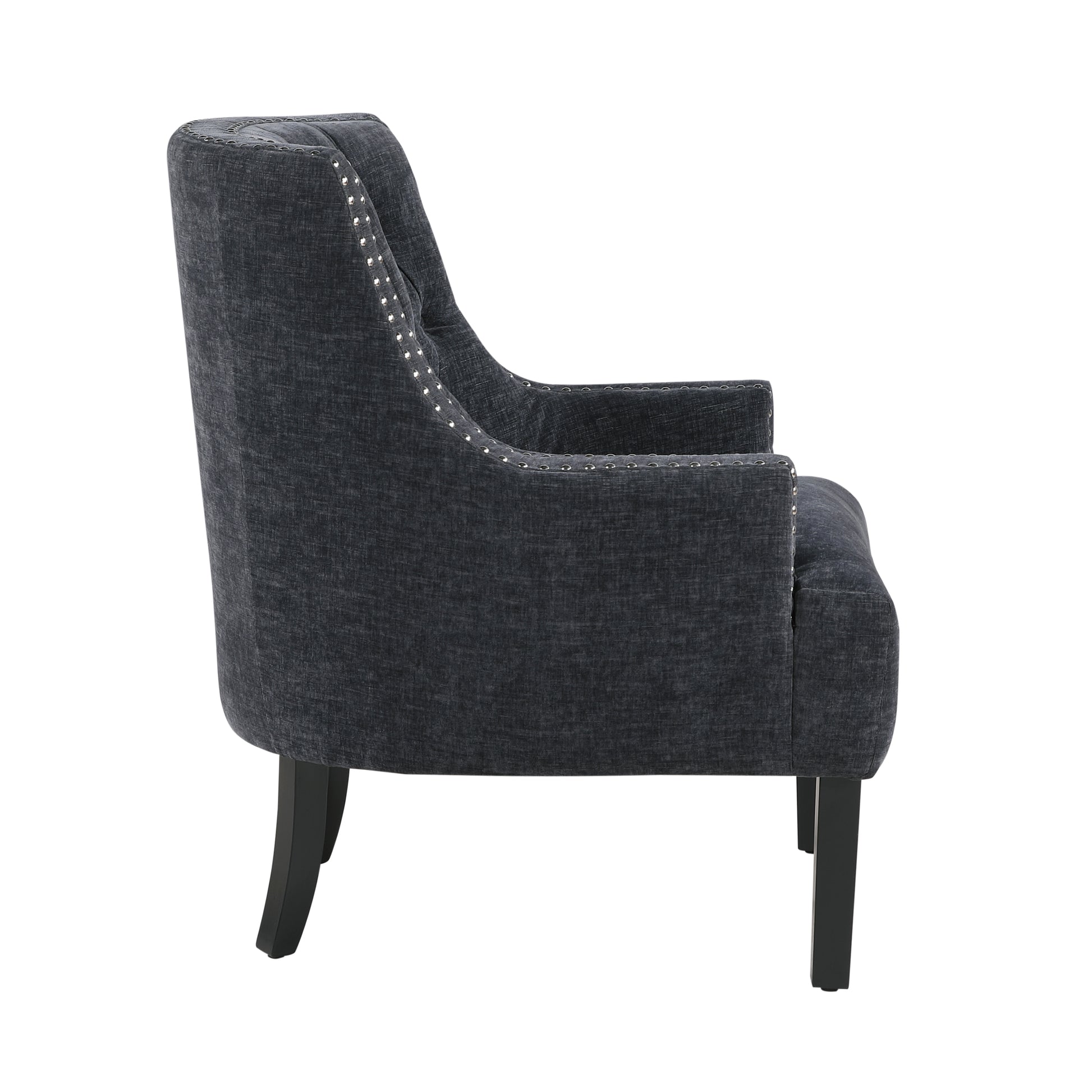 Charcoal gray upholstered accent chair with button tufting and silver nailhead trim