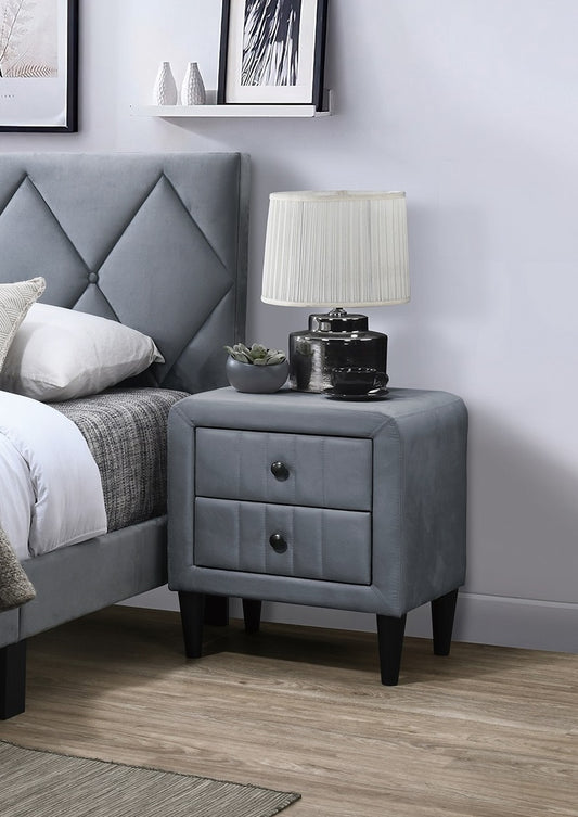 Gray upholstered nightstand with two drawers and black knobs