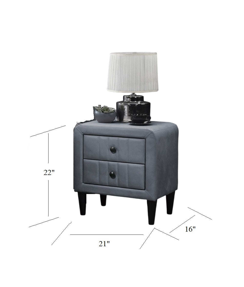 Gray upholstered nightstand with two drawers and black knobs