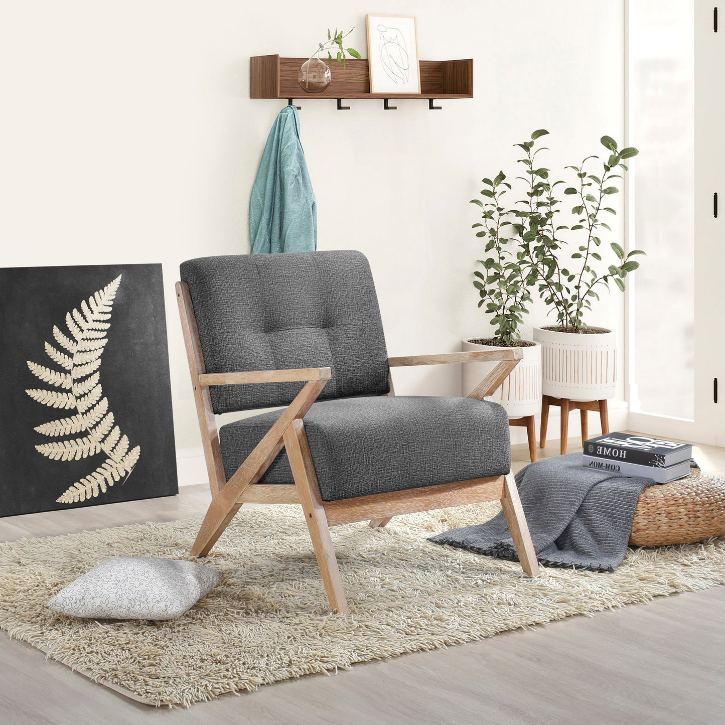 Midcentury modern accent chair with dark grey textured fabric and natural wood frame