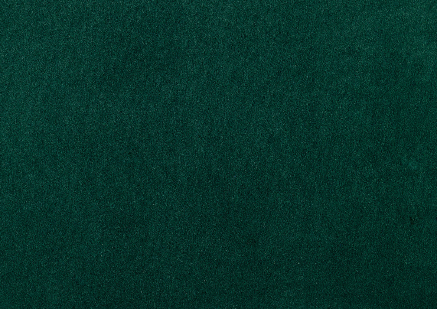 Deep forest green velvet fabric swatch for upholstery projects