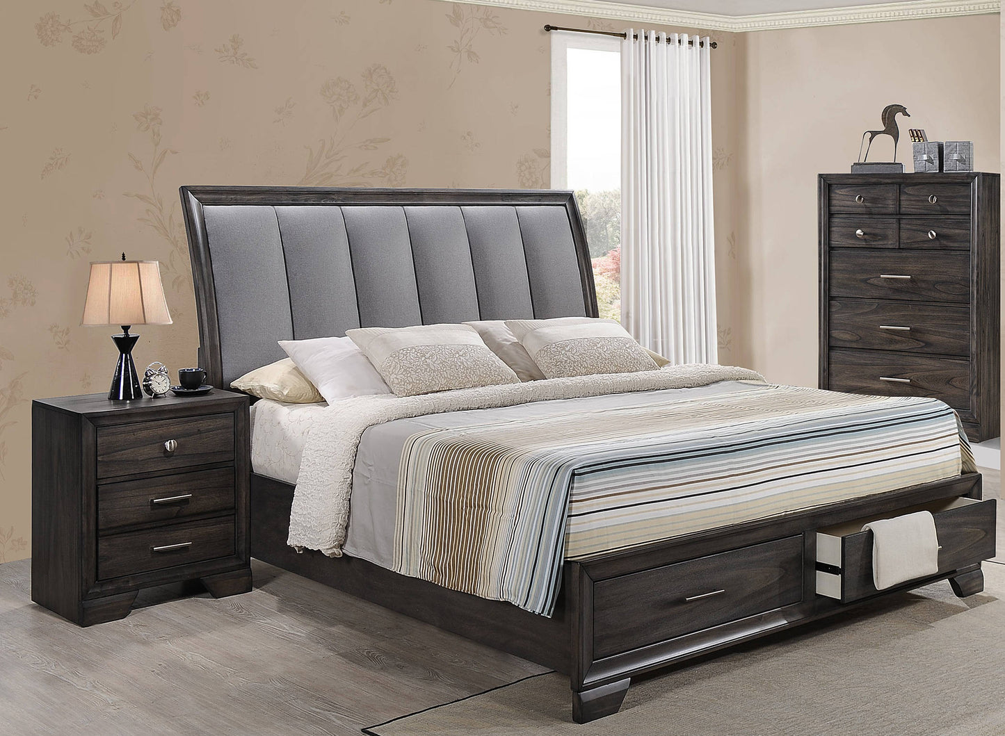 Dark wood platform bed with upholstered grey headboard and storage drawers