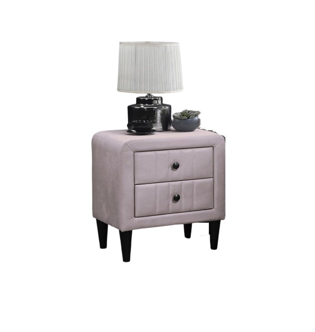 Pink velvet upholstered nightstand with two drawers and black knobs