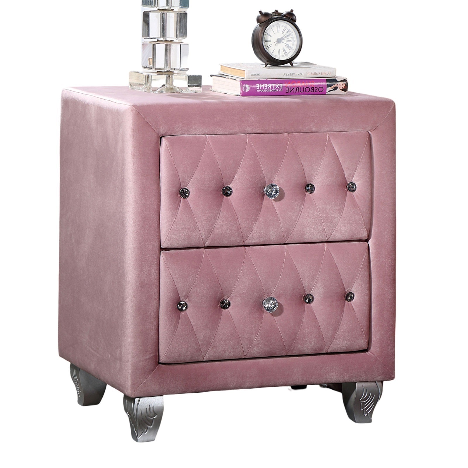 Pink velvet tufted nightstand with crystal knobs and ornate silver legs