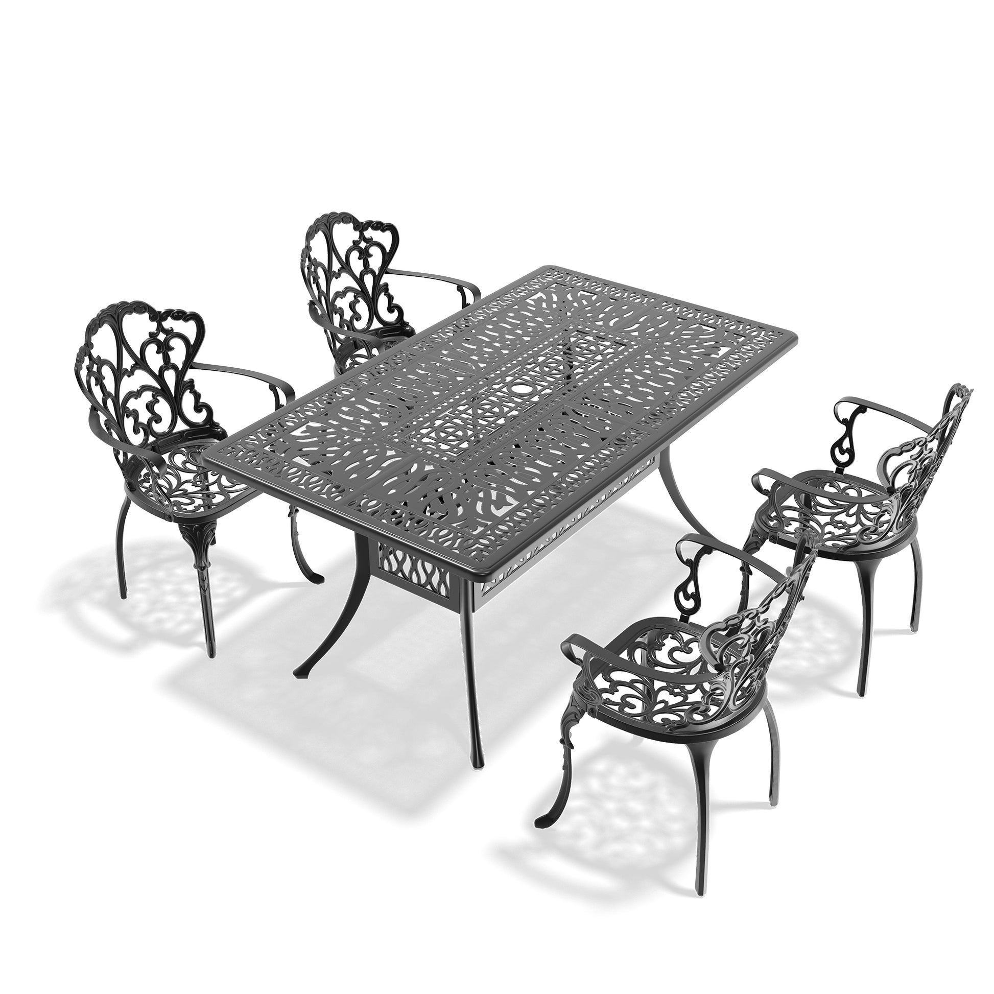 Ornate cast iron patio dining set with ornate table and four chairs