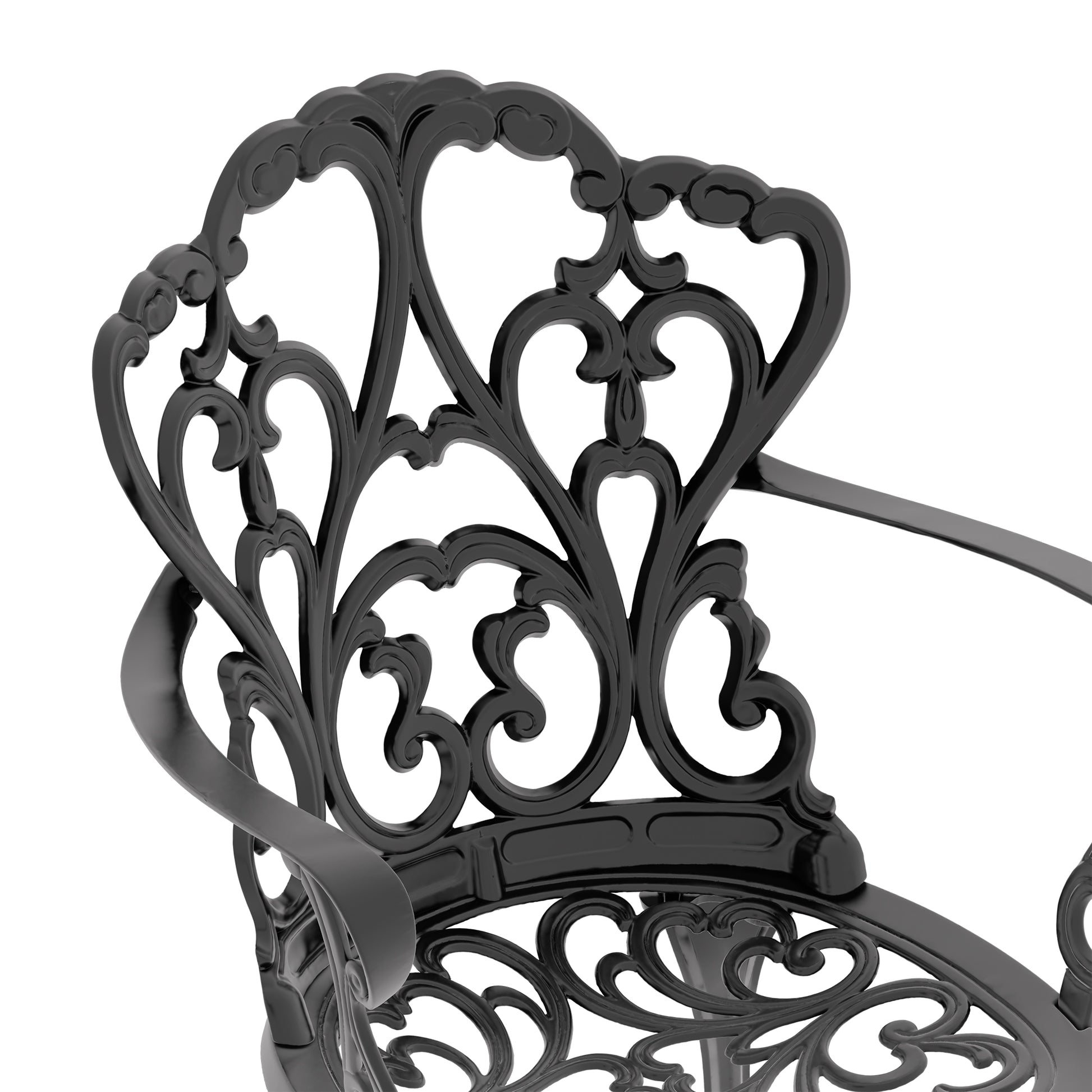 Black cast iron chair with ornate scrollwork and antique design for outdoor seating