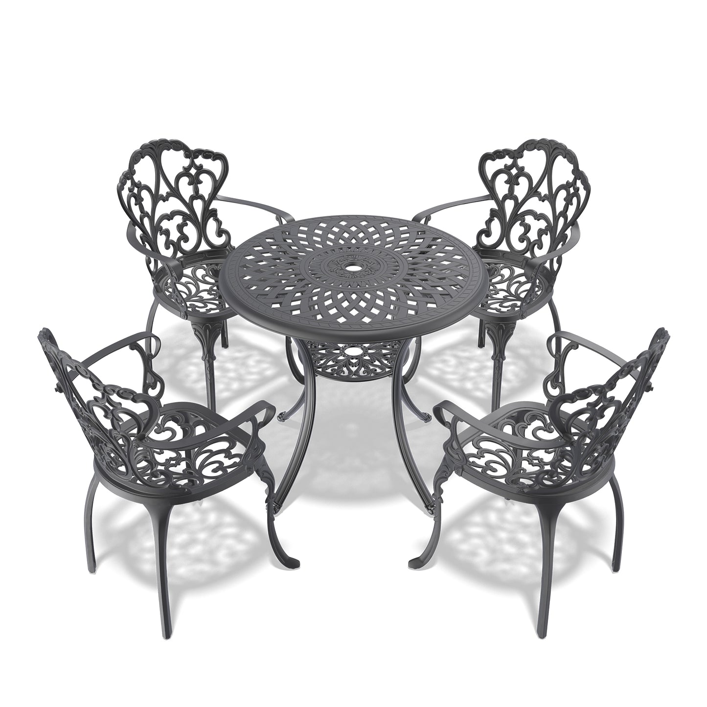 Ornate dark grey cast iron bistro set with intricate scrollwork for outdoor dining