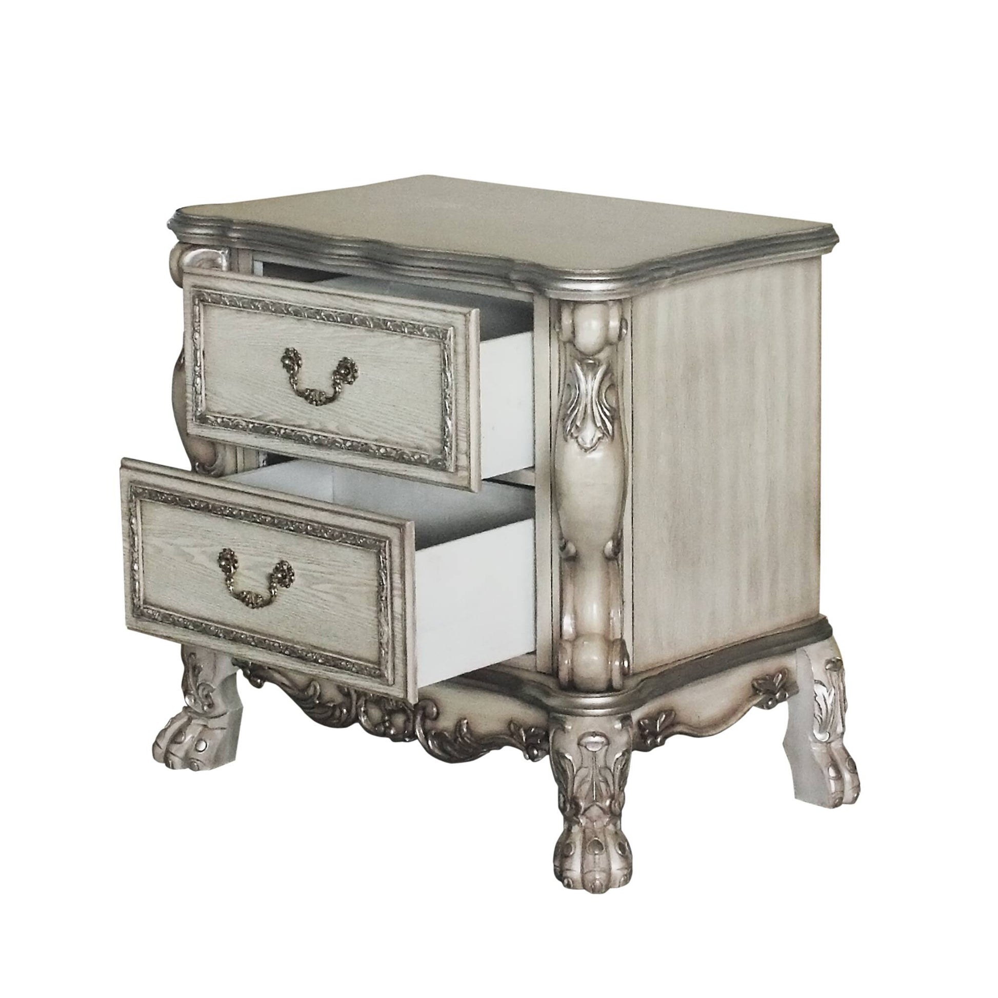 Antique white ornate nightstand with silver trim and two drawers a stylish bedside table