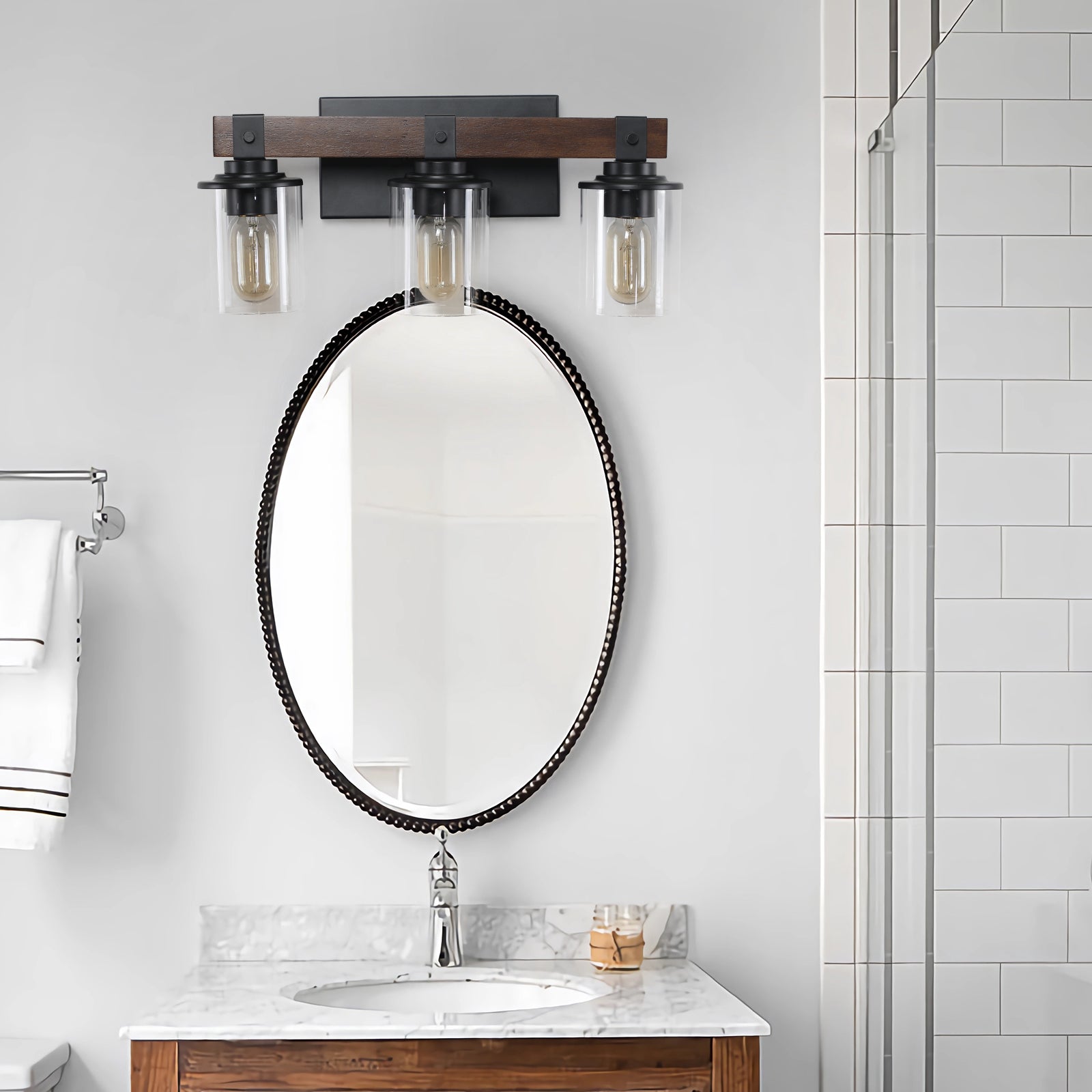 Rustic industrial bathroom vanity light with three Edison bulbs and a dark wood beam