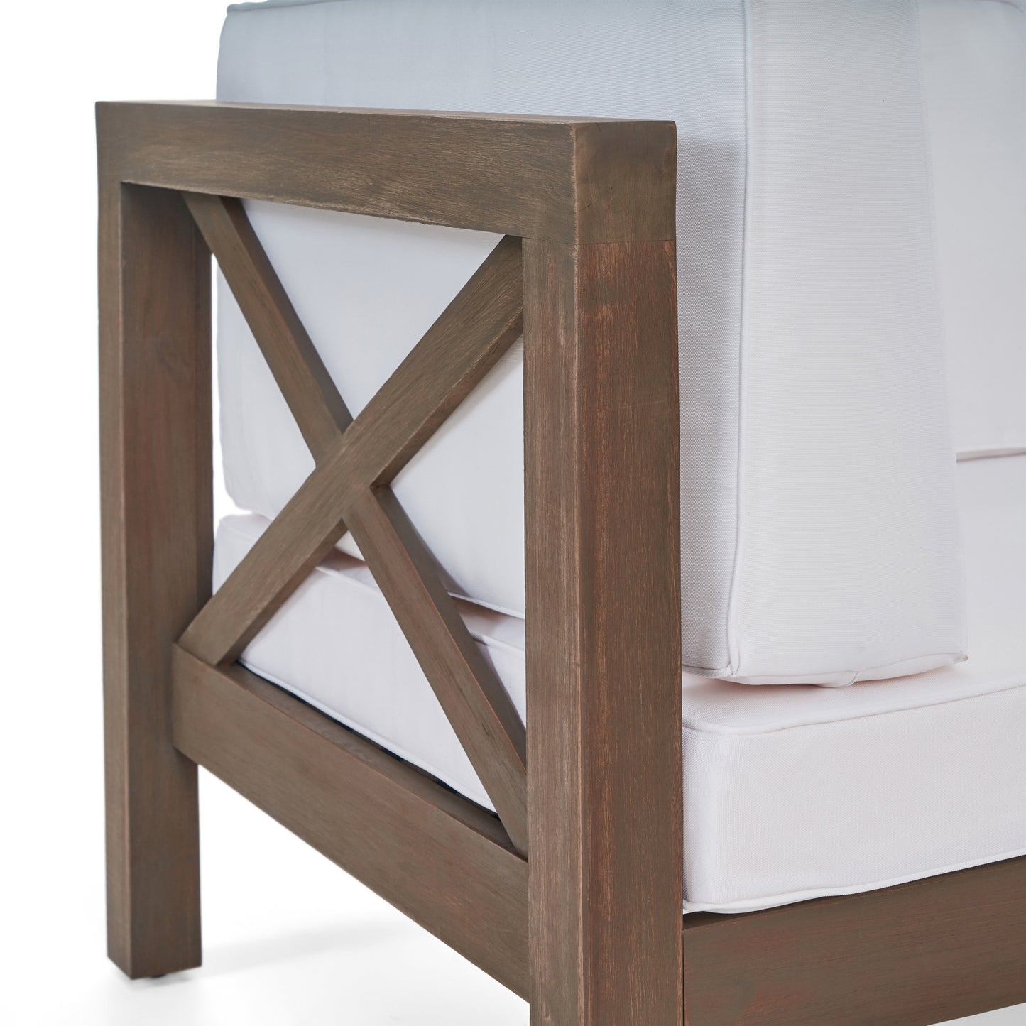Rustic brown wood armchair with white cushions featuring an Xbrace design on the armrest for outdoor seating