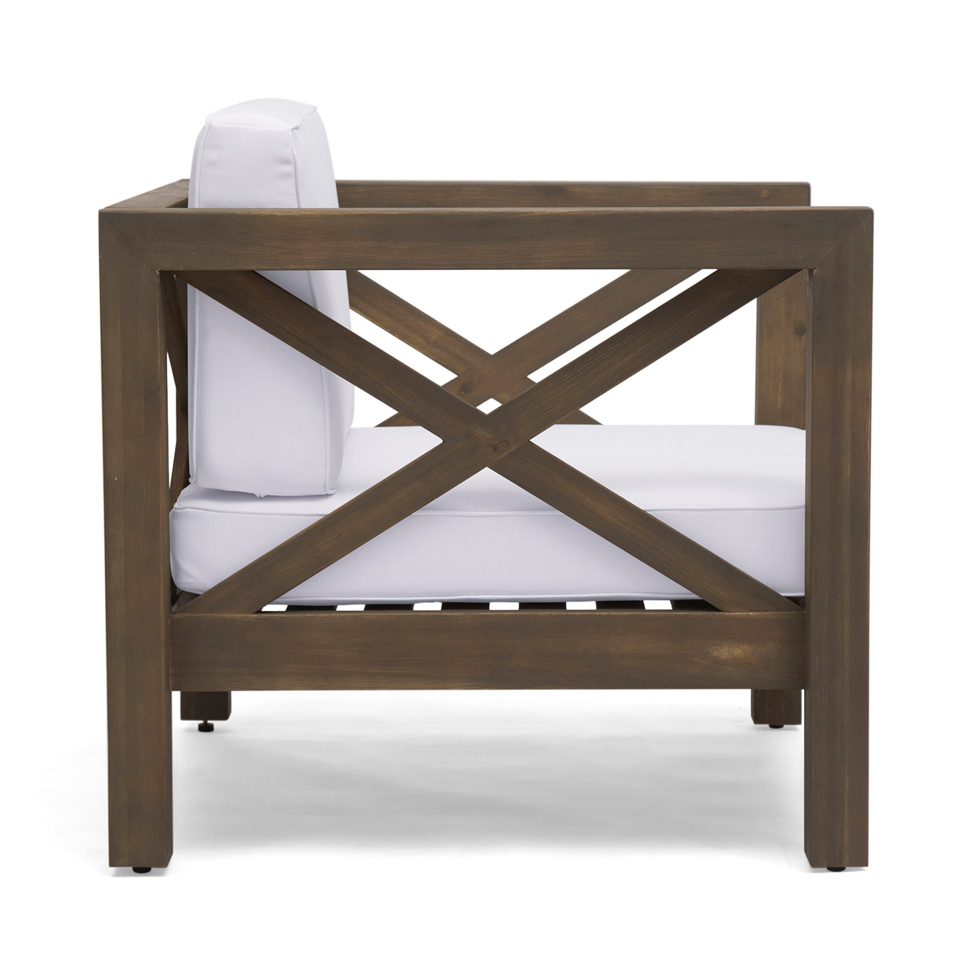 Side view of a modern wooden armchair with white cushions and Xshaped frame details