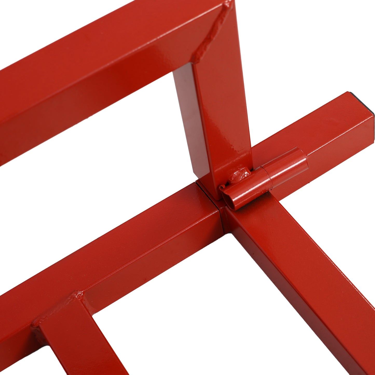 Closeup of a red metal workbench leg with a sturdy welded joint