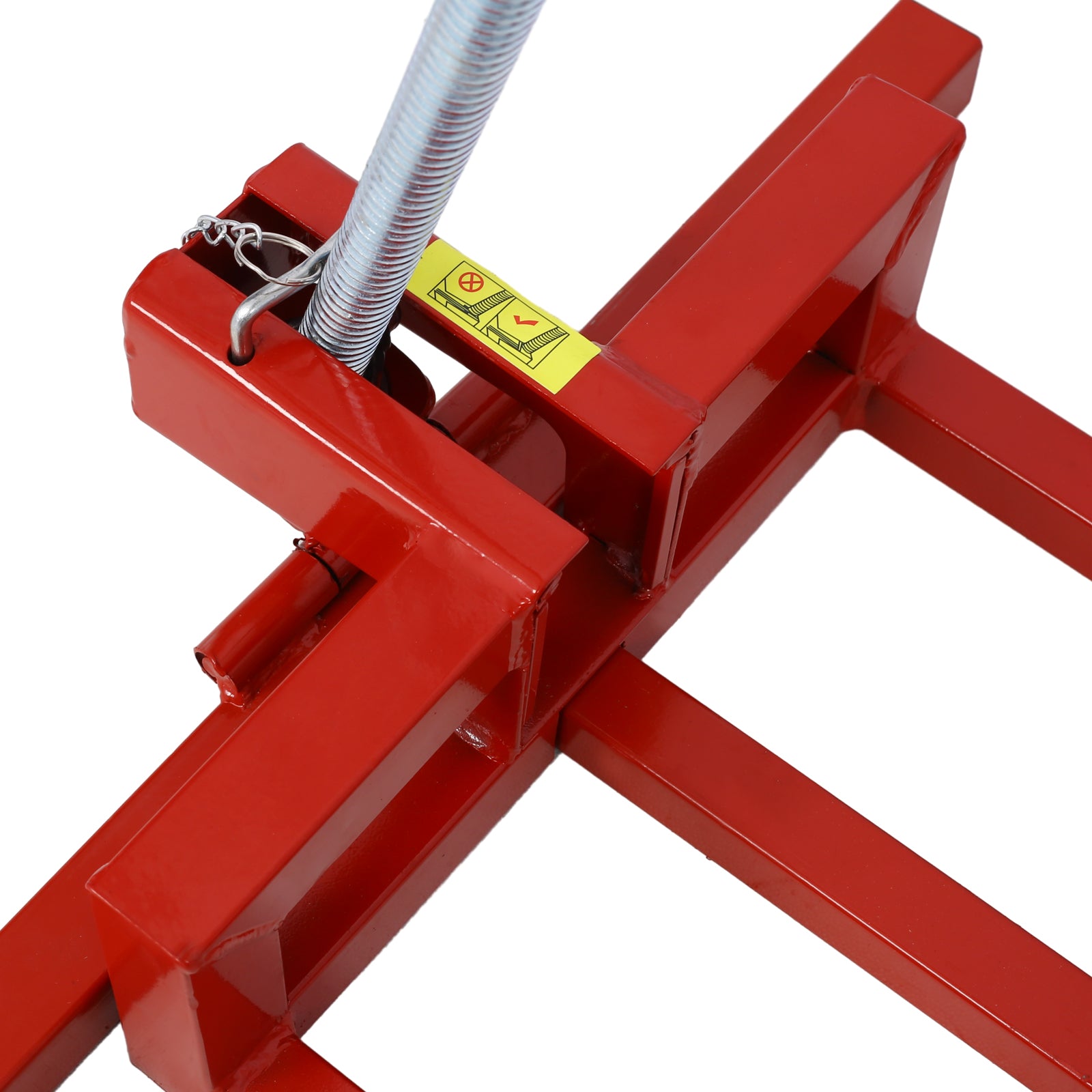 Red metal pallet jack hydraulic pump assembly with visible spring mechanism