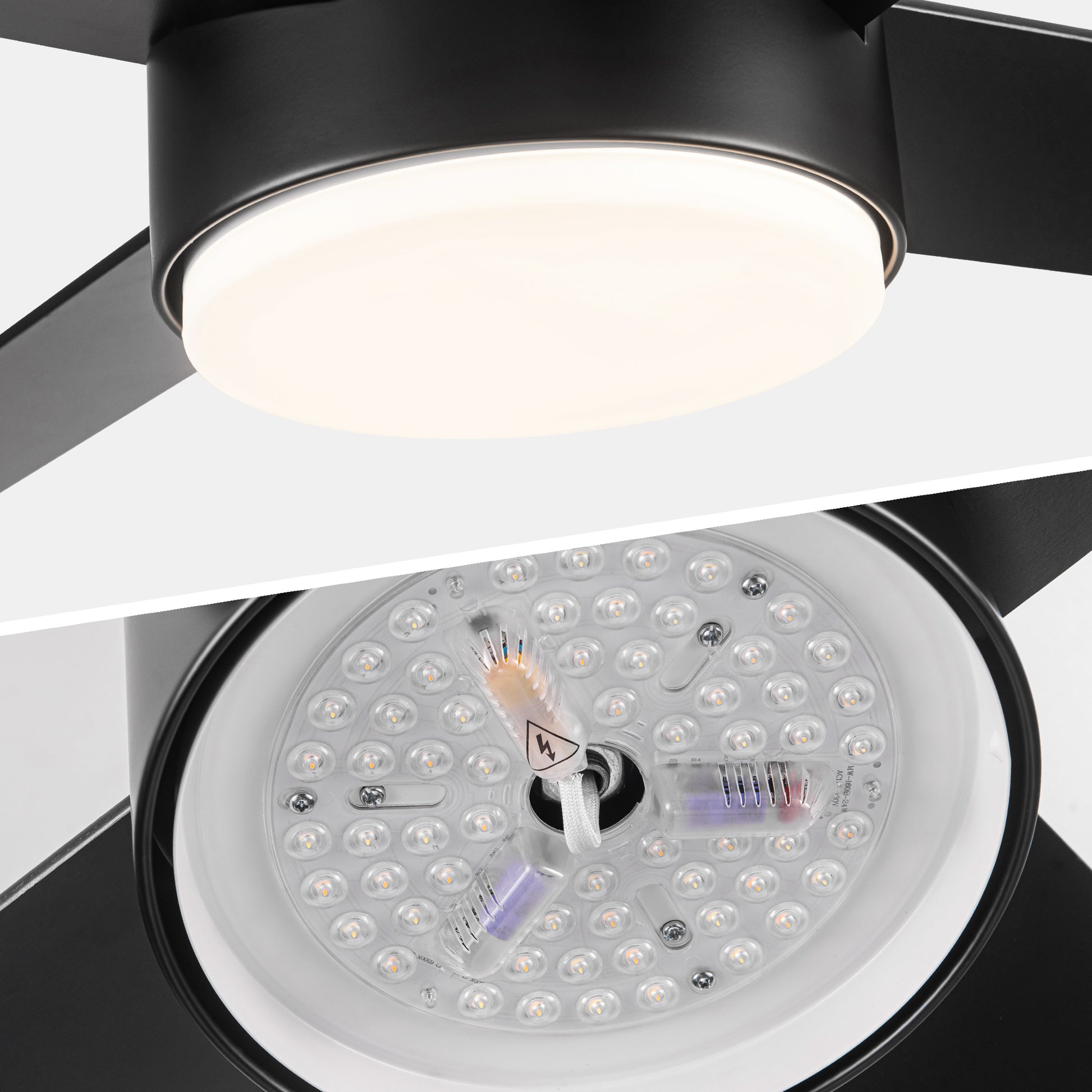 Black ceiling fan with integrated LED light showing illuminated opal diffuser