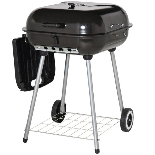 Black charcoal grill with side table and wheels perfect for backyard cooking